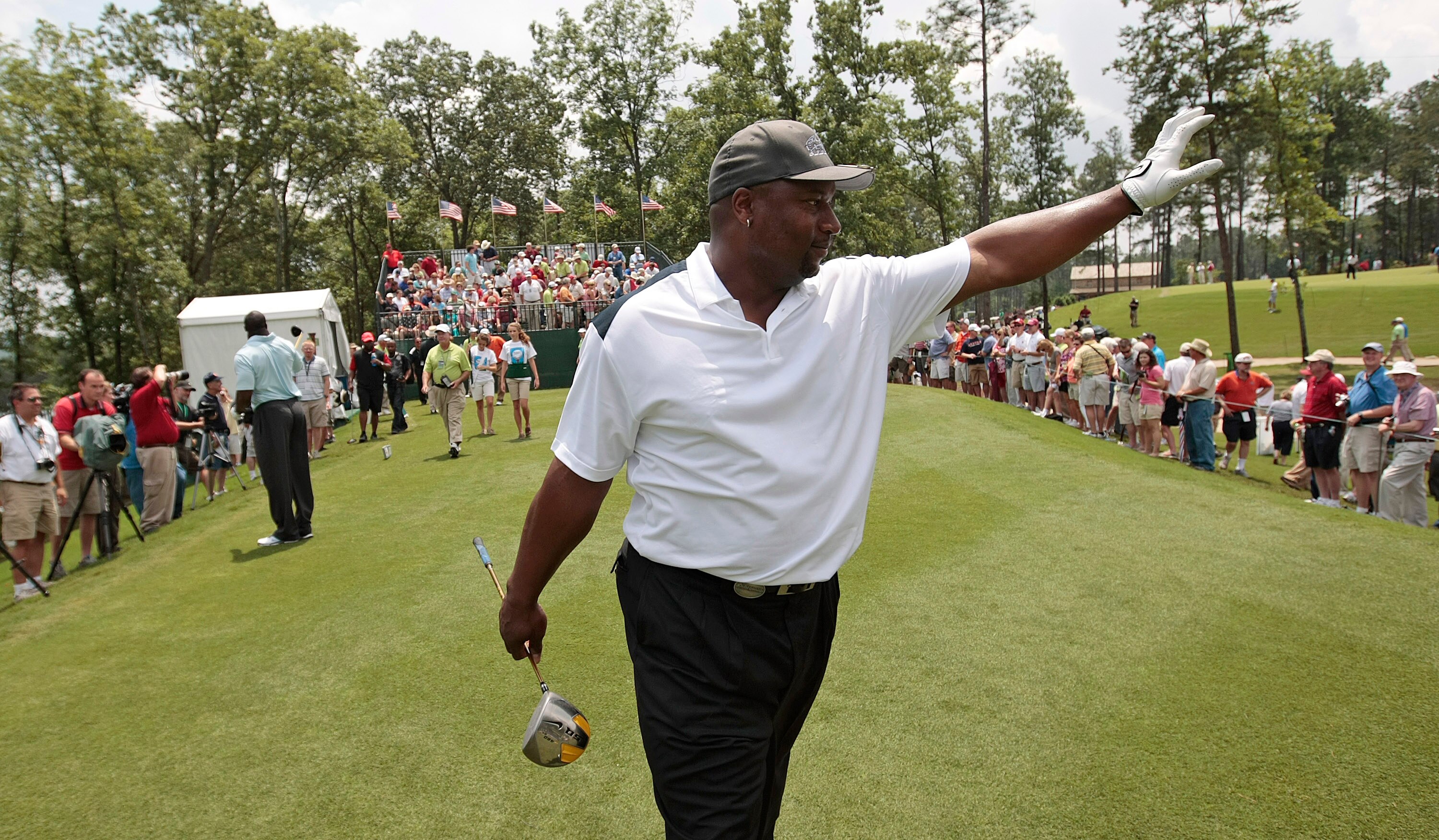 BIRMINGHAM, AL - MAY 14: Former NFL football star Bo Jackson waves to fans as he walks off the first tee during the Thursday Pro-AM of the Regions Charity Classic at the Robert Trent Jones Golf Trail at Ross Bridge on May 14, 2009  in Birmingham, Alabama.