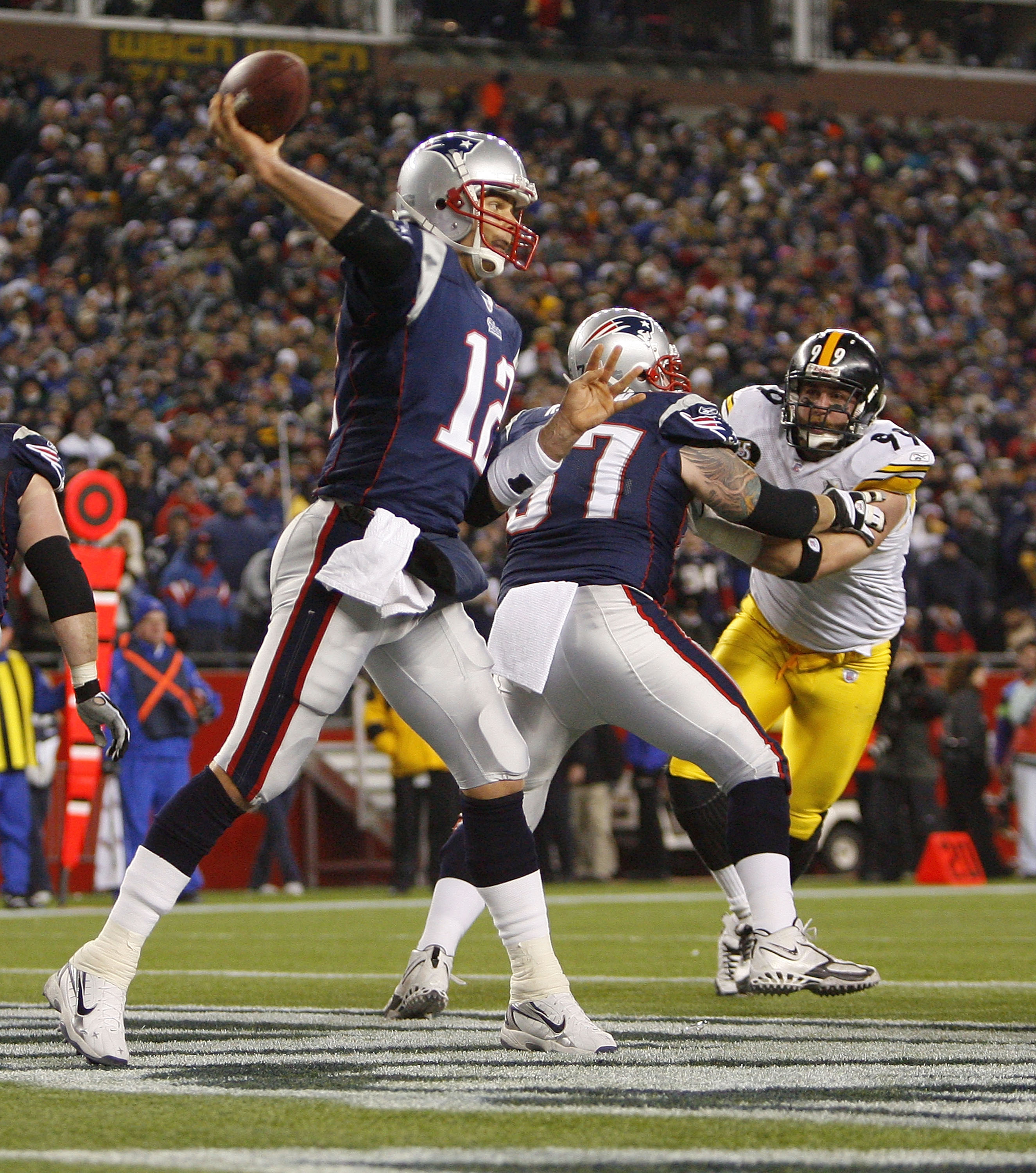 FOXBORO, MA - DECEMBER 9:   Tom Brady #12 of the New England Patriots throws during a game with the Pittsburgh Steelers at Gillette Stadium December 9, 2007 in Foxboro, Massachusetts. The Patriots won 34-13.  (Photo by Jim Rogash/Getty Images)