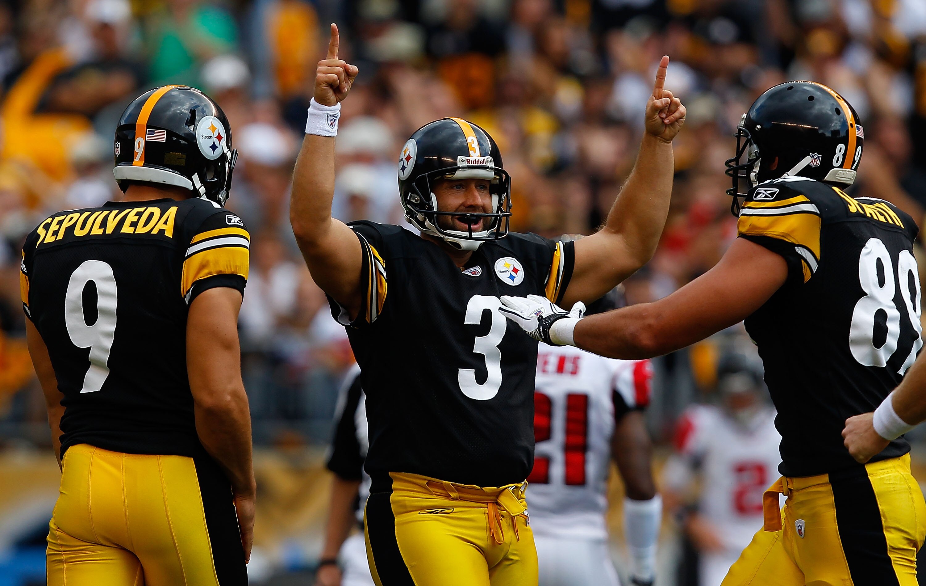 PITTSBURGH - SEPTEMBER 12:  Jeff Reed #3 of the Pittsburgh Steelers celebrates with teammates Daniel Sepulveda #9 and Matt Spaeth #89 after kicking a 52-yard field goal against the Atlanta Falcons during the NFL season opener game on September 12, 2010 at