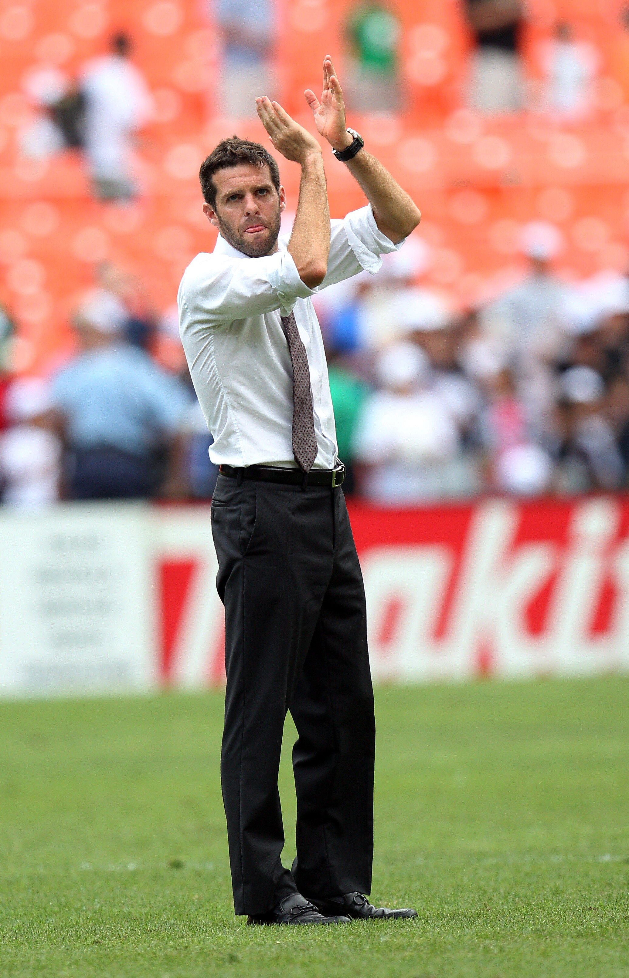 WASHINGTON - AUGUST 22: Head coach Ben Olsen of D.C. United claps toward the crowd against Philadelphia Union at RFK Stadium on August 22, 2010 in Washington, DC. D.C. United won 2-0. (Photo by Ned Dishman/Getty Images)