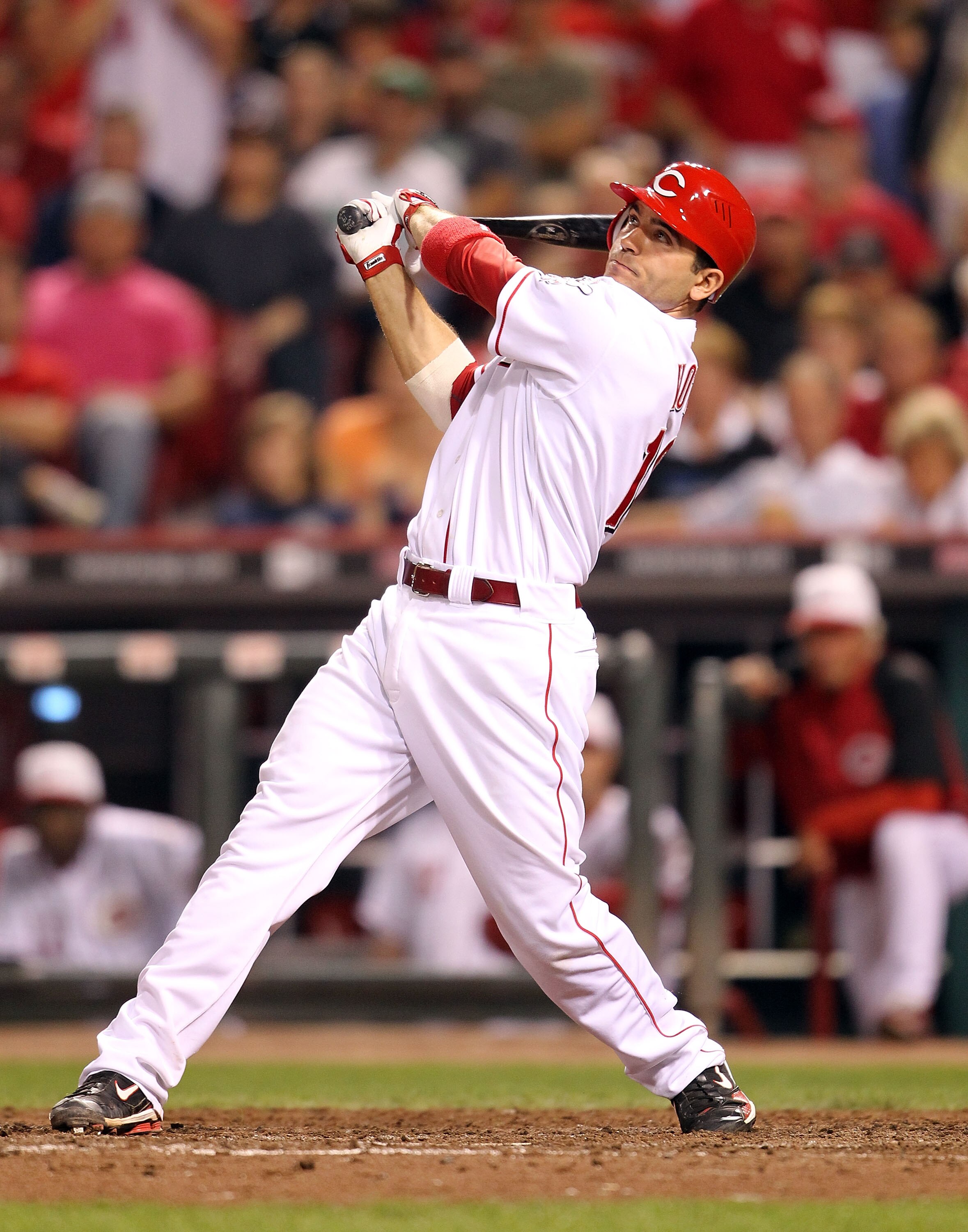 CINCINNATI - SEPTEMBER 11:  Joey Votto #19 of the Cincinnati Reds hits a game winning home run during the game against the Pittsburg Pirates at Great American Ball Park on September 11, 2010 in Cincinnati, Ohio. The Reds won 5-4  (Photo by Andy Lyons/Gett