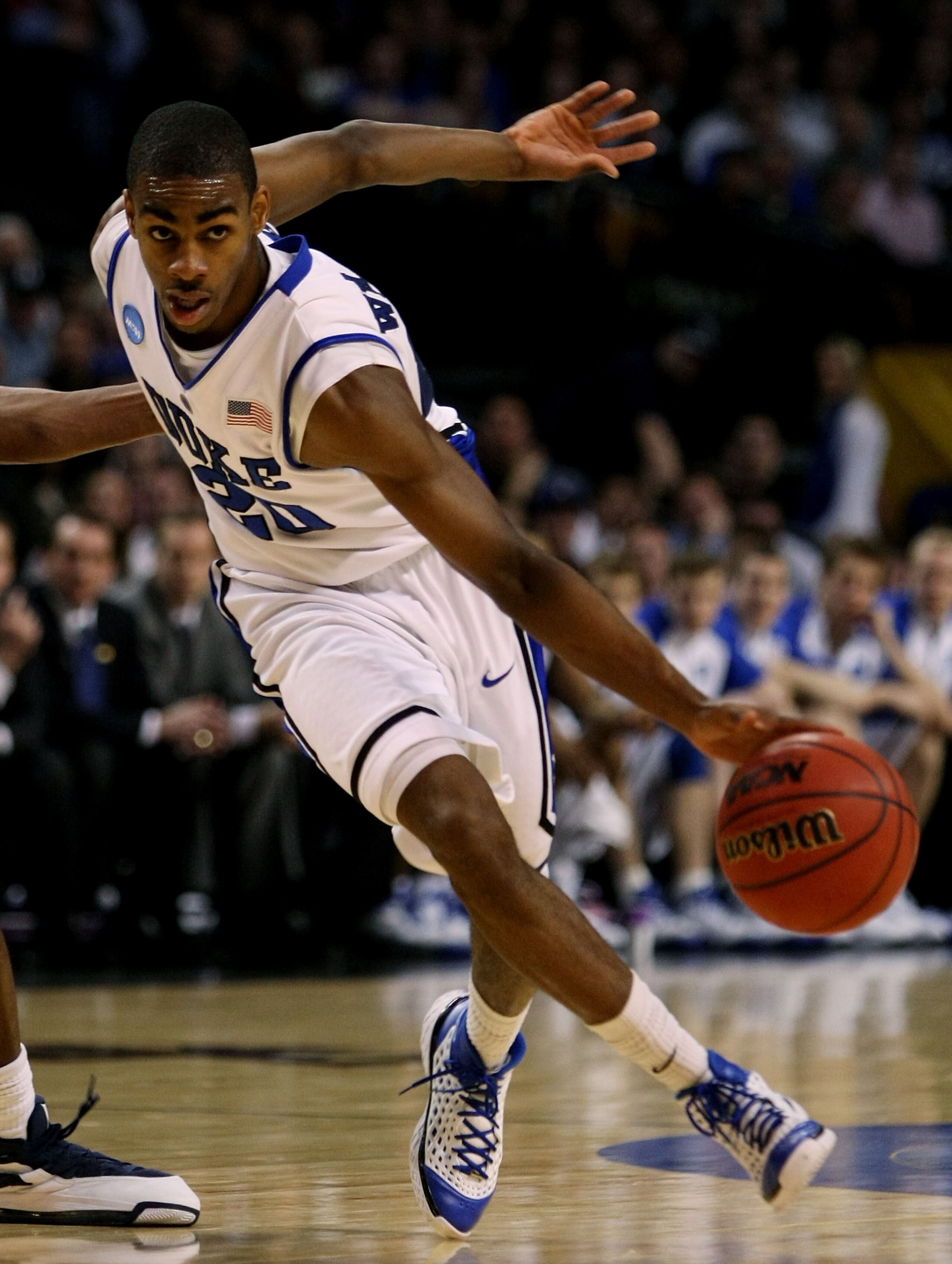 BOSTON - MARCH 26:  Elliot Williams #20 of the Duke Blue Devils dribbles against the Villanova Wildcats during the NCAA Men's Basketball Tournament East Regionals at TD Banknorth Garden on March 26, 2009 in Boston, Massachusetts.  (Photo by Elsa/Getty Ima