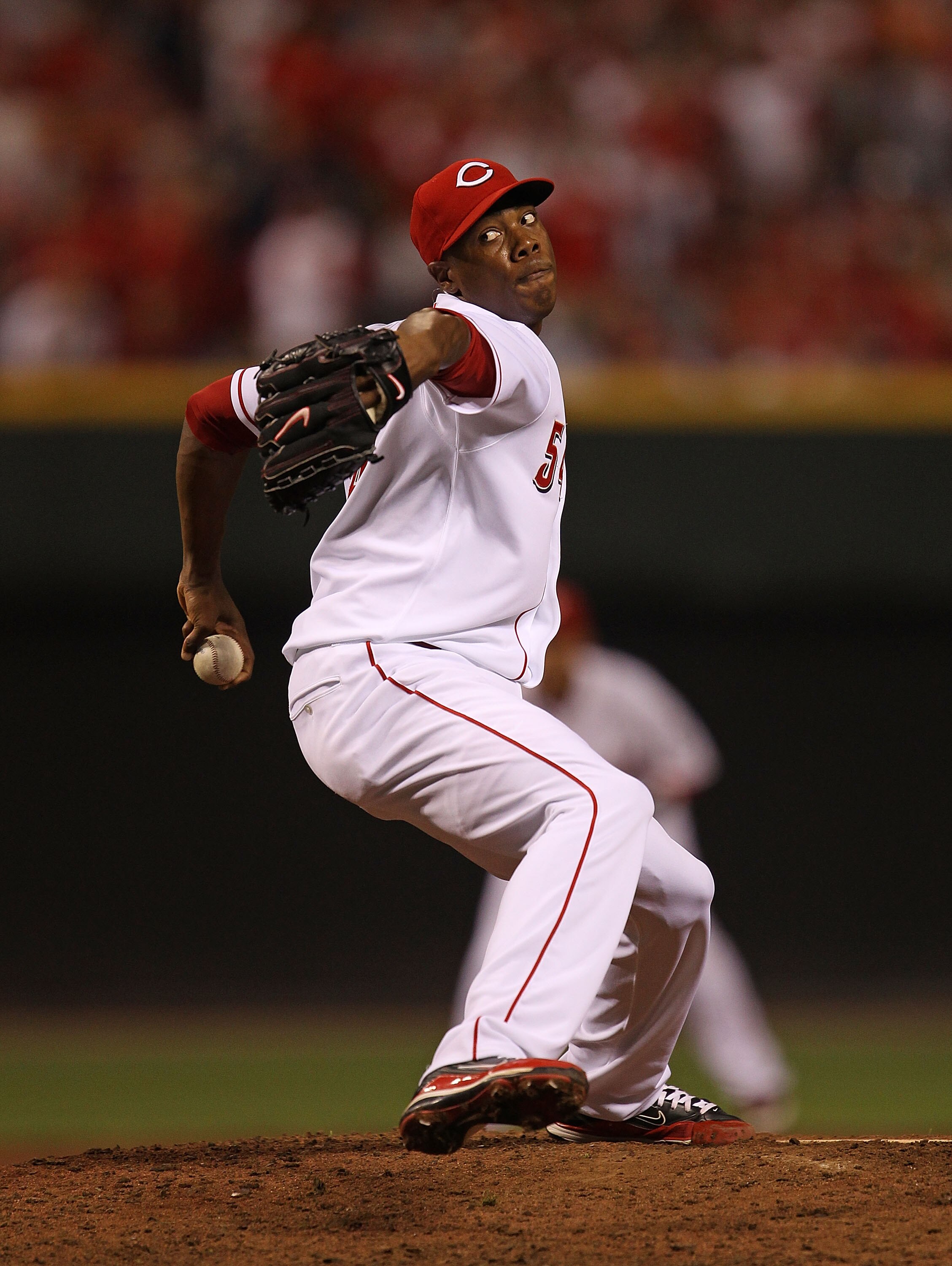 CINCINNATI - OCTOBER 10: Aroldis Chapman #54 of the Cincinnati Reds pitches in the 9th inning against the Philadelphia Phillies during game 3 of the NLDS at Great American Ball Park on October 10, 2010 in Cincinnati, Ohio. The Phillies defeated the Reds 2