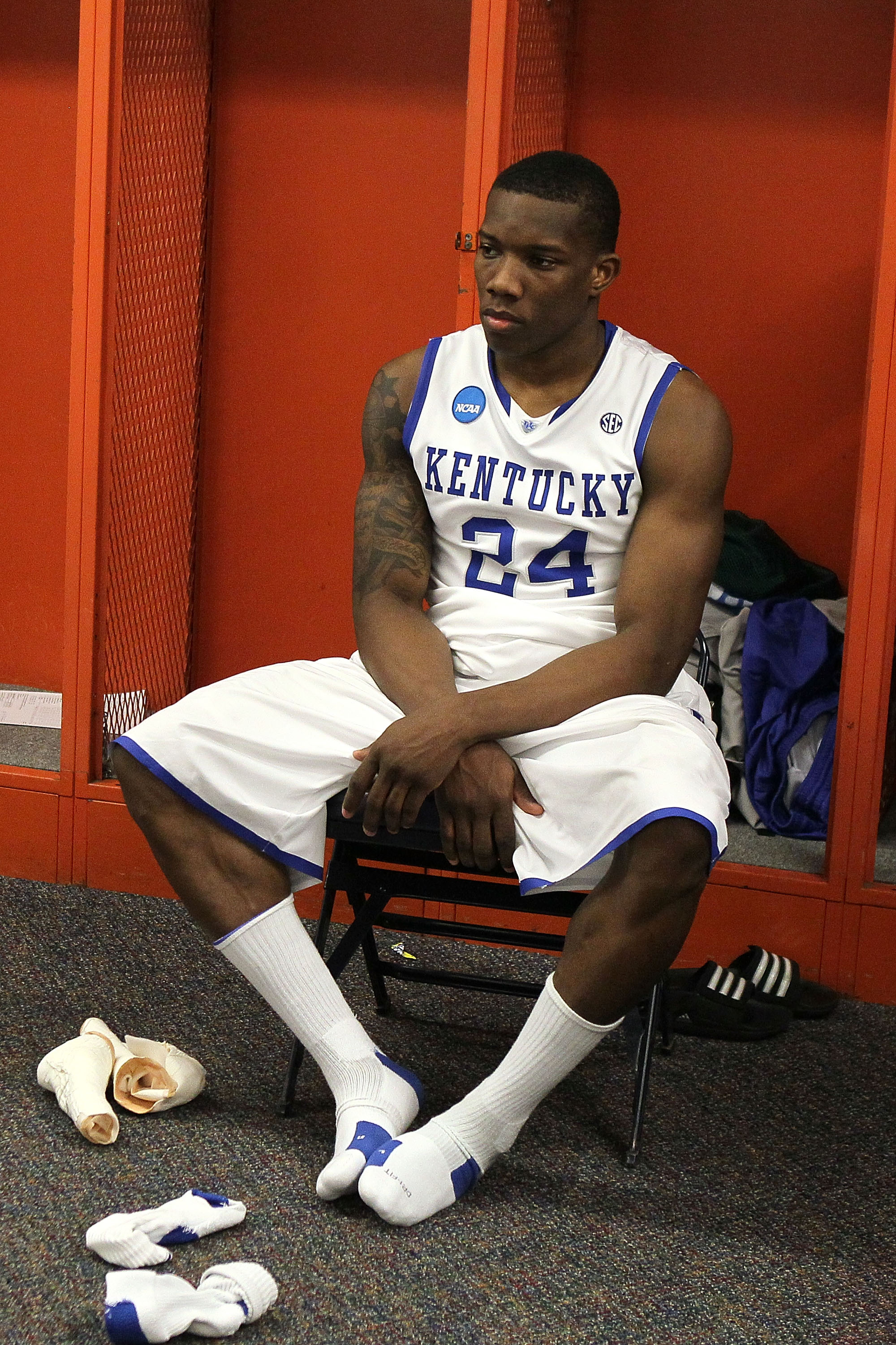 SYRACUSE, NY - MARCH 27:  Eric Bledsoe #24 of the Kentucky Wildcats sits in the locker room dejected after they lost 73-66 against the West Virginia Mountaineers during the east regional final of the 2010 NCAA men's basketball tournament at the Carrier Do