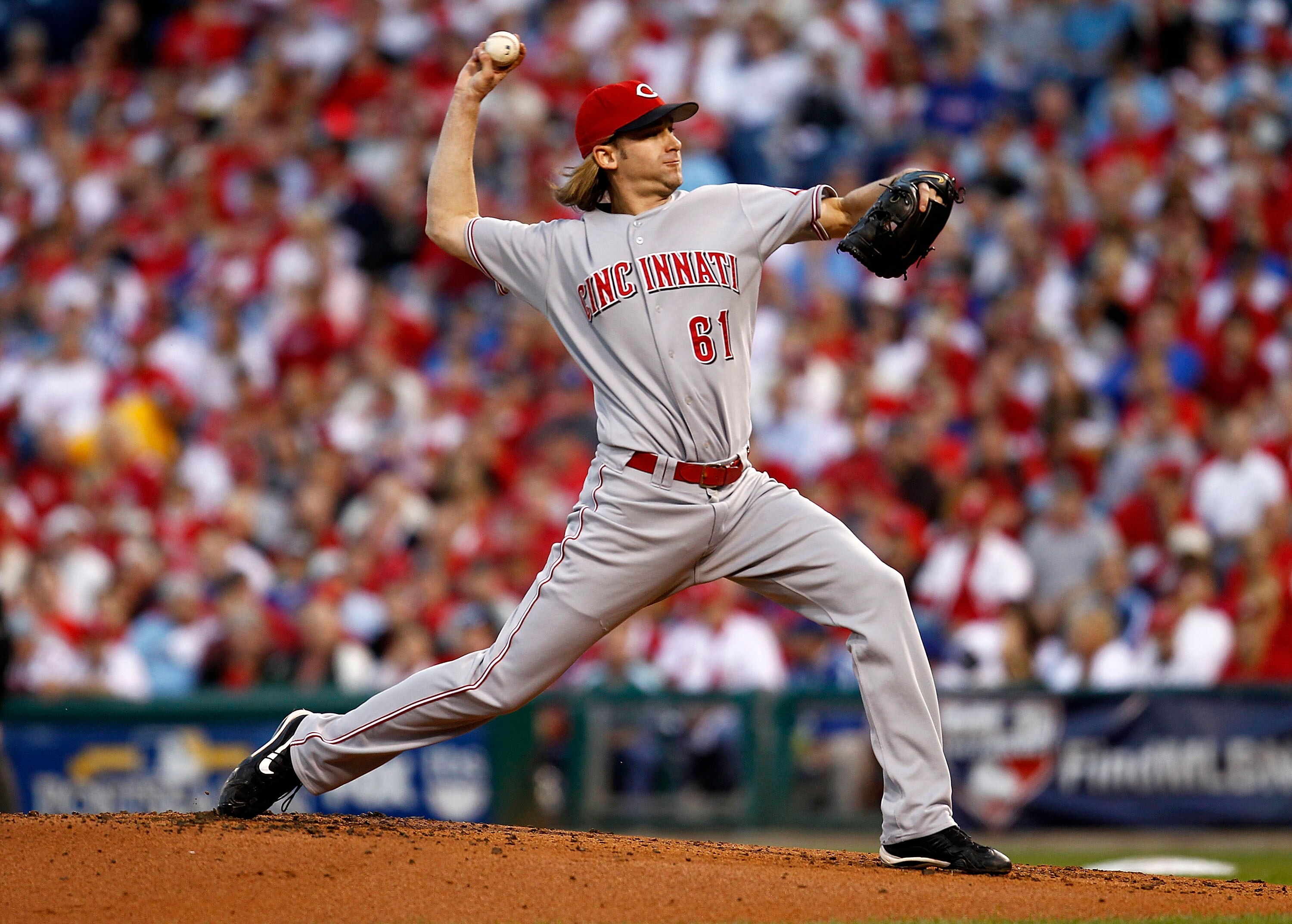 PHILADELPHIA - OCTOBER 08:  Bronson Arroyo #61 of the Cincinnati Reds pitches in Game 2 of the NLDS against the Philadelphia Phillies at Citizens Bank Park on October 8, 2010 in Philadelphia, Pennsylvania.  (Photo by Jeff Zelevansky/Getty Images)