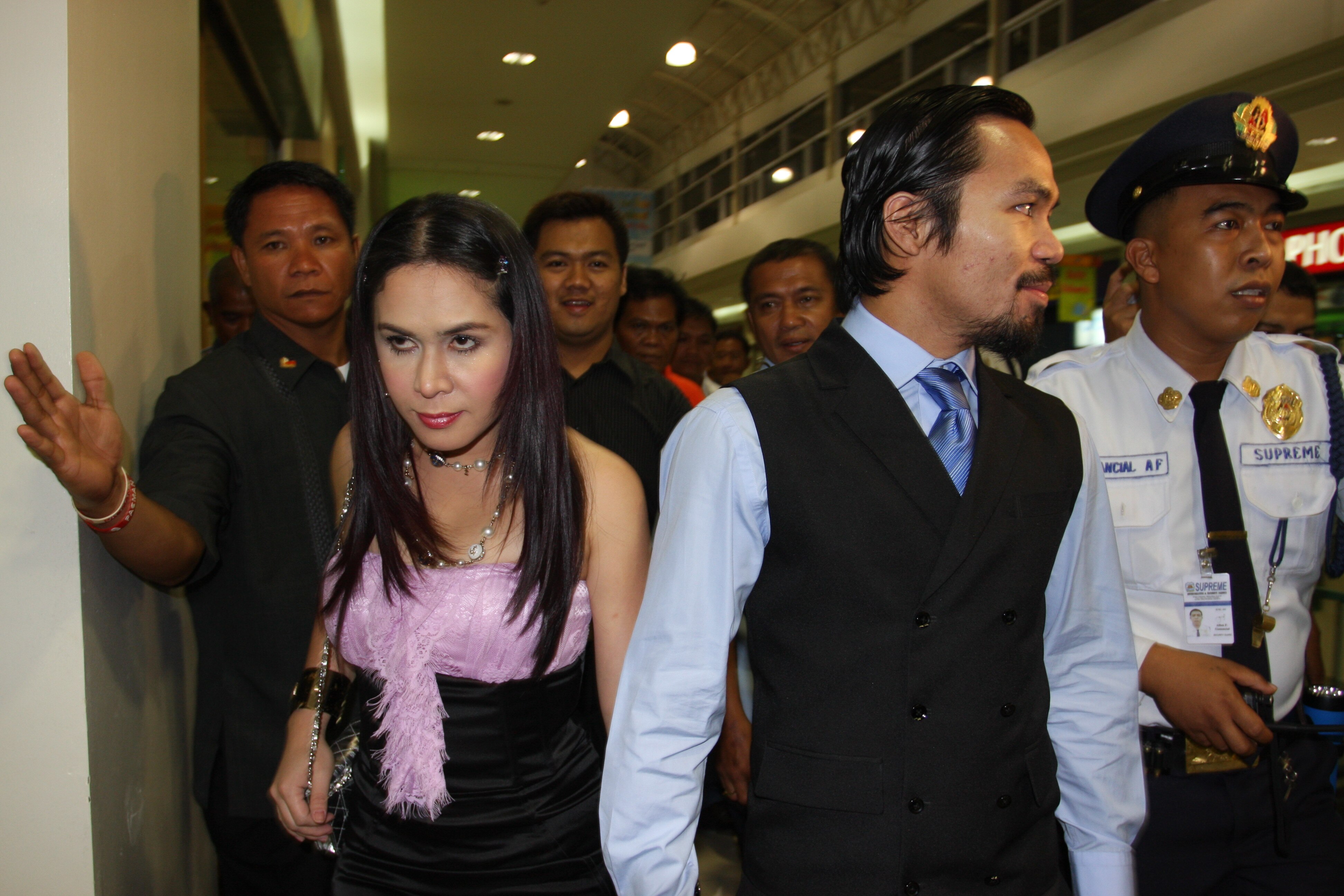 GENERAL SANTOS, PHILIPPINES - MAY 15:  World welterweight boxing champion Manny Pacquiao and wife Jinkee Pacquiao arrive at the KCC Mall on May 15, 2010 in General Santos, Philippines. Pacquiao was there to celebrate his election on becoming a member of H
