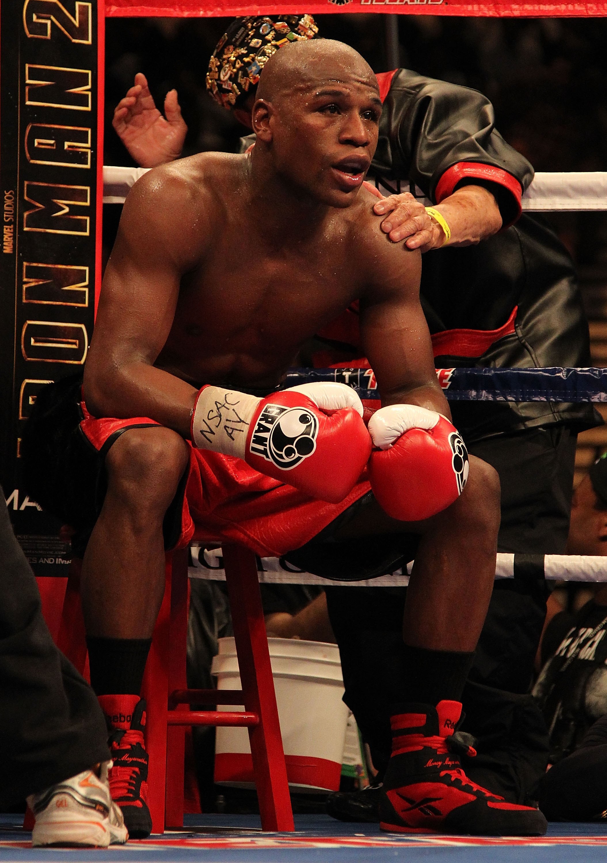 LAS VEGAS - MAY 01:  Floyd Mayweather Jr. looks on from his corner against Shane Mosley during their welterweight fight at the MGM Grand Garden Arena on May 1, 2010 in Las Vegas, Nevada. Mayweather Jr. defeated Mosley by unanimous decison.  (Photo by Jed