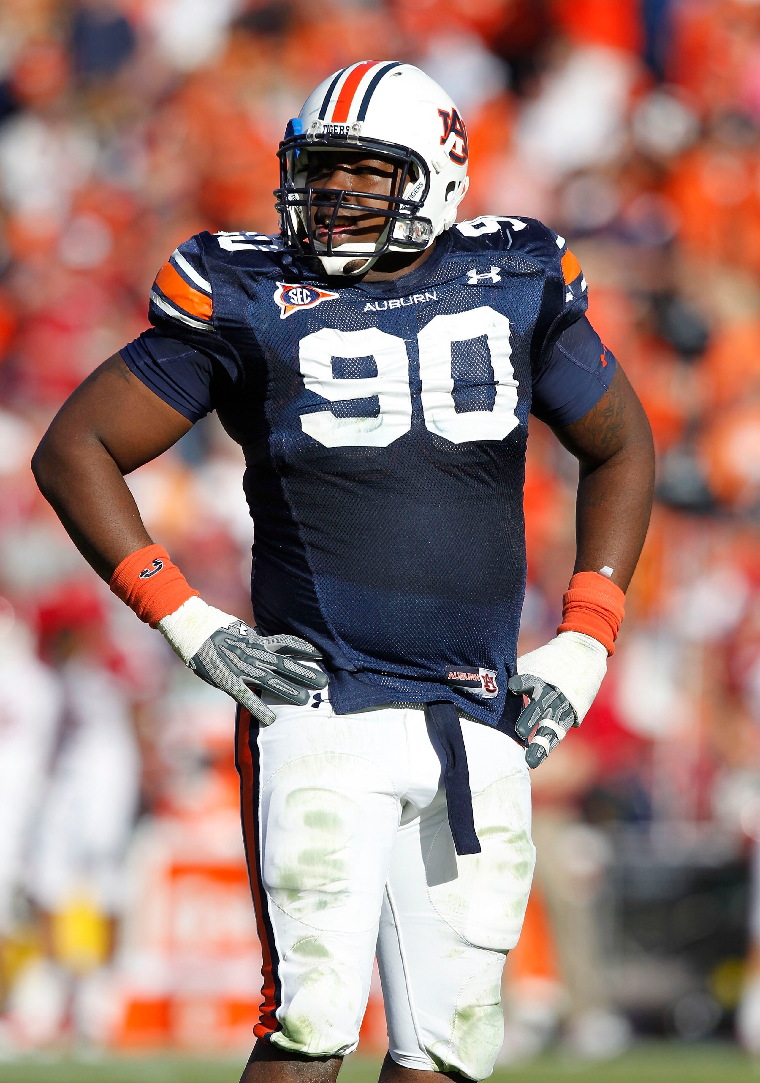 AUBURN - OCTOBER 16:  Defensive lineman Nick Fairley #90 of the Auburn Tigers takes a break on the field during the game against the Arkansas Razorbacks at Jordan-Hare Stadium on October 16, 2010 in Auburn, Alabama.  (Photo by Mike Zarrilli/Getty Images)
