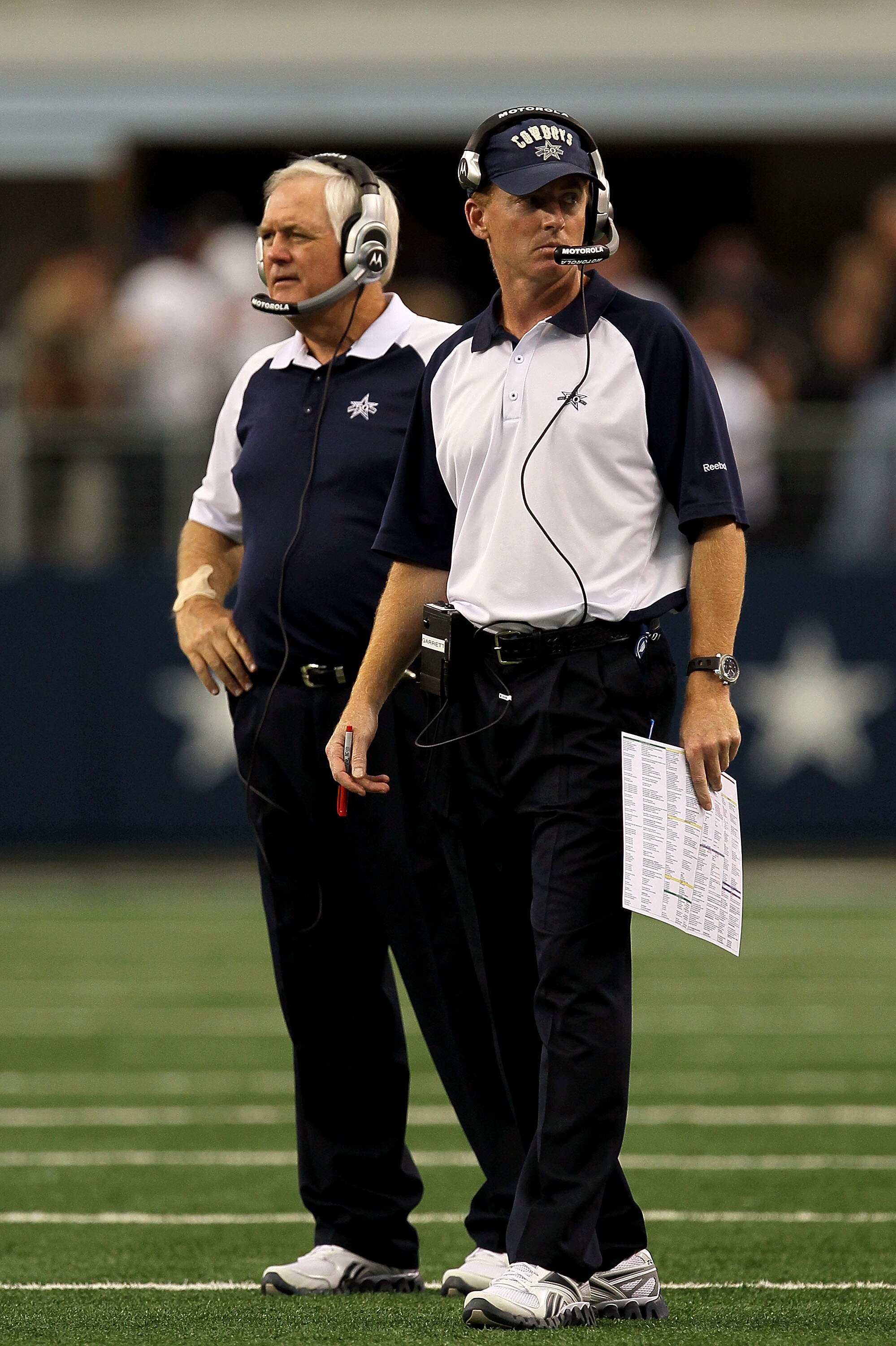 ARLINGTON, TX - OCTOBER 31:  (L-R) Head coach Wade Phillips and assistant head coach/offensive coordinator Jason Garrett of the Dallas Cowboys look on against the Jacksonville Jaguars at Cowboys Stadium on October 31, 2010 in Arlington, Texas.  (Photo by