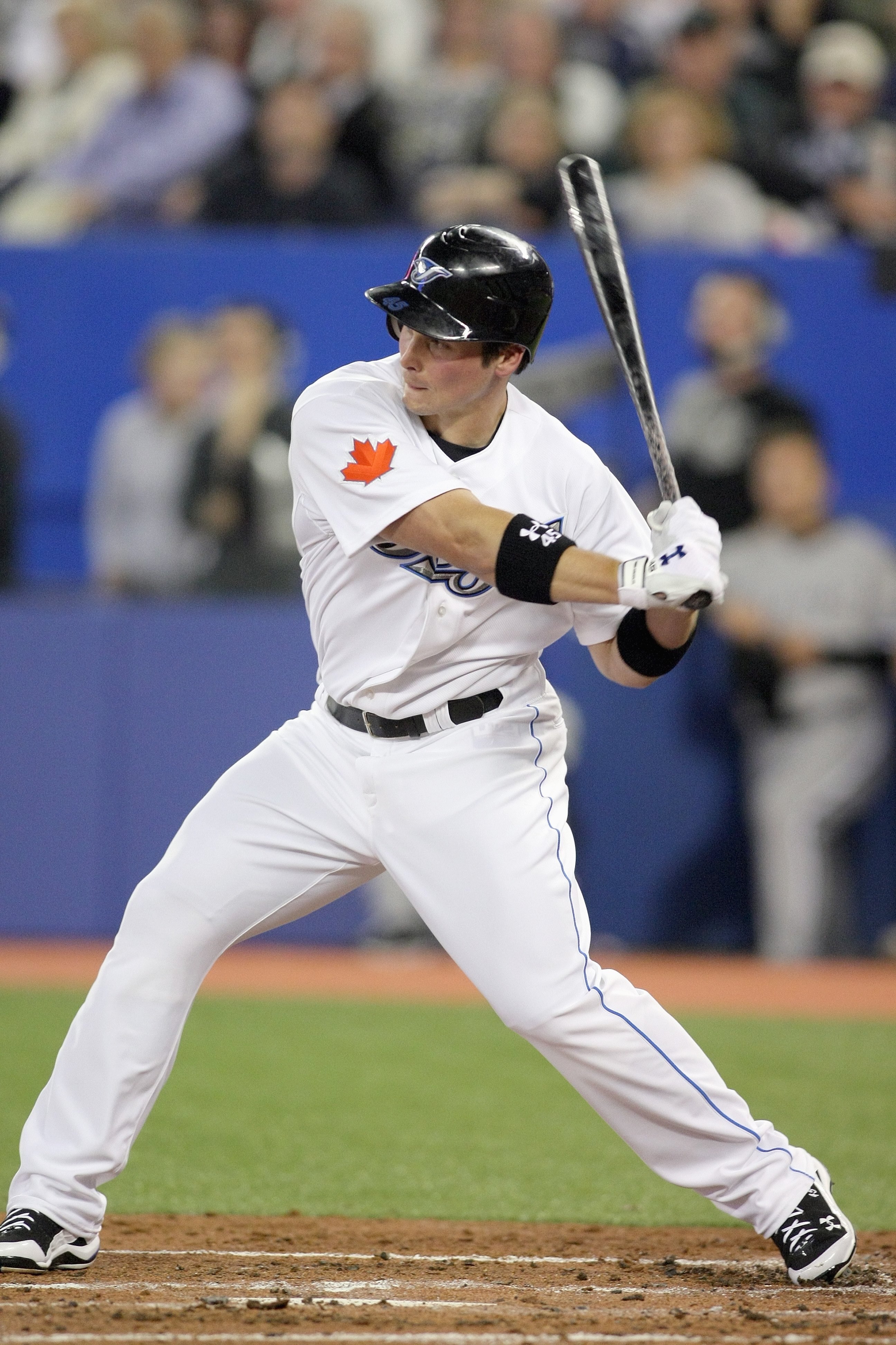 TORONTO - APRIL 12:  Travis Snider #45 of the Toronto Blue Jays swings at the pitch during the game against the Chicago White Sox at the Rogers Centre on April 12, 2010 in Toronto, Ontario. (Photo By Dave Sandford/Getty Images)