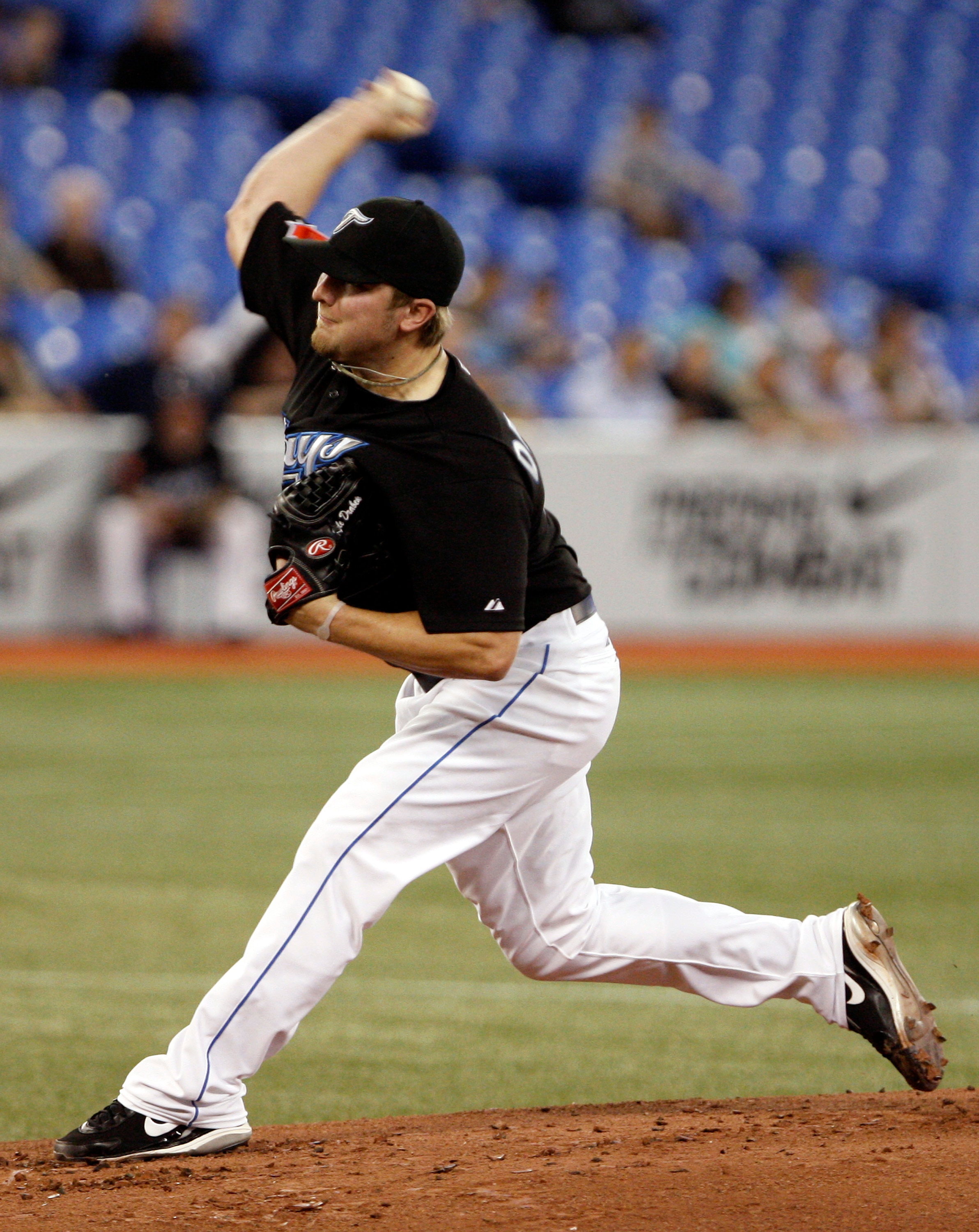 TORONTO, ON - SEPTEMBER 28: Kyle Drabek #4 of the Toronto Blue Jays throws agianst the New York Yankees during an MLB game at the Rogers Centre September 28, 2010 in Toronto, Ontario, Canada. (Photo by Abelimages/Getty Images)