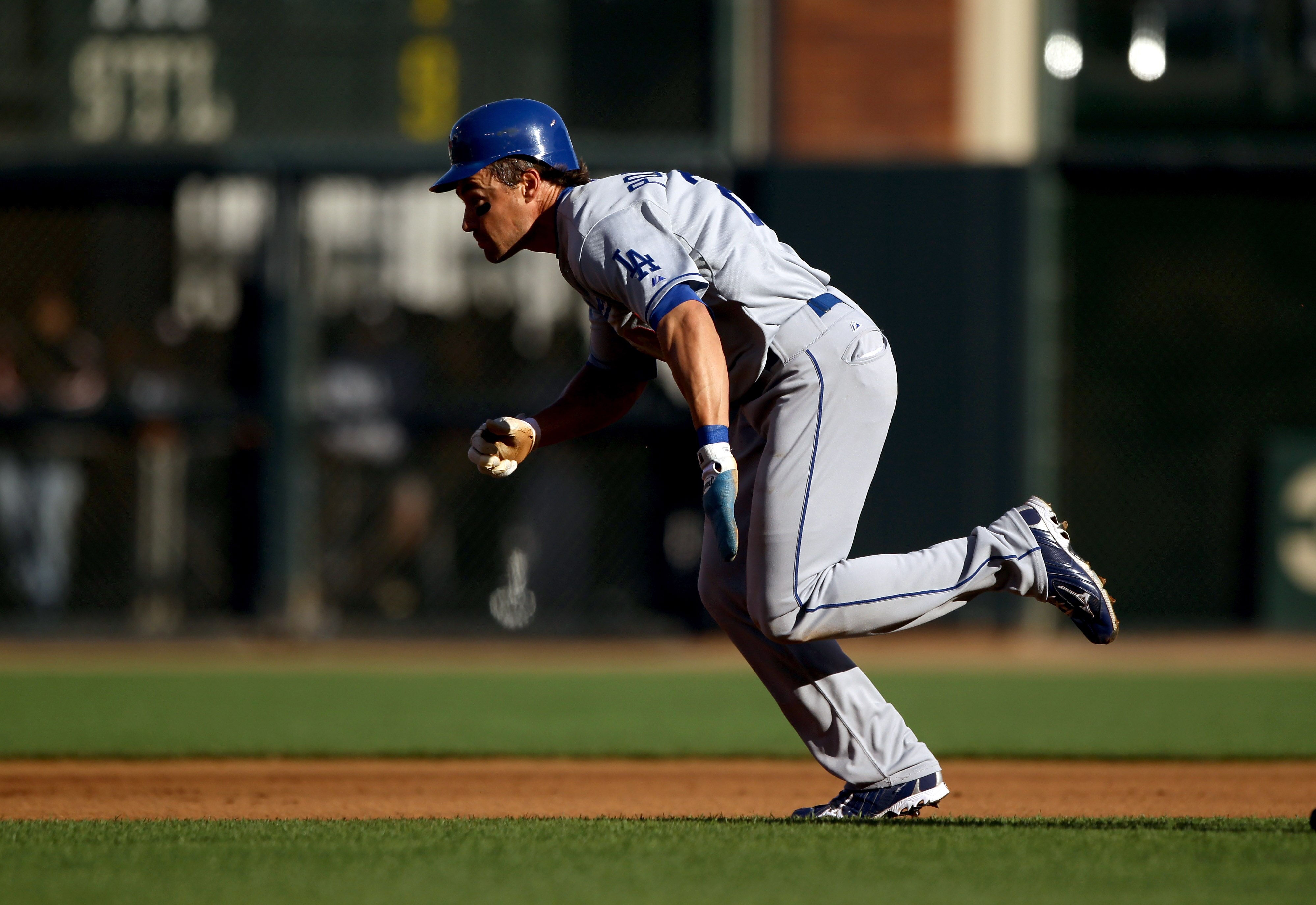 SAN FRANCISCO - AUGUST 01:  Scott Podsednik #21 of the Los Angeles Dodgers runs to second base during their game against the San Francisco Giants at AT&T Park on August 1, 2010 in San Francisco, California.  (Photo by Ezra Shaw/Getty Images)