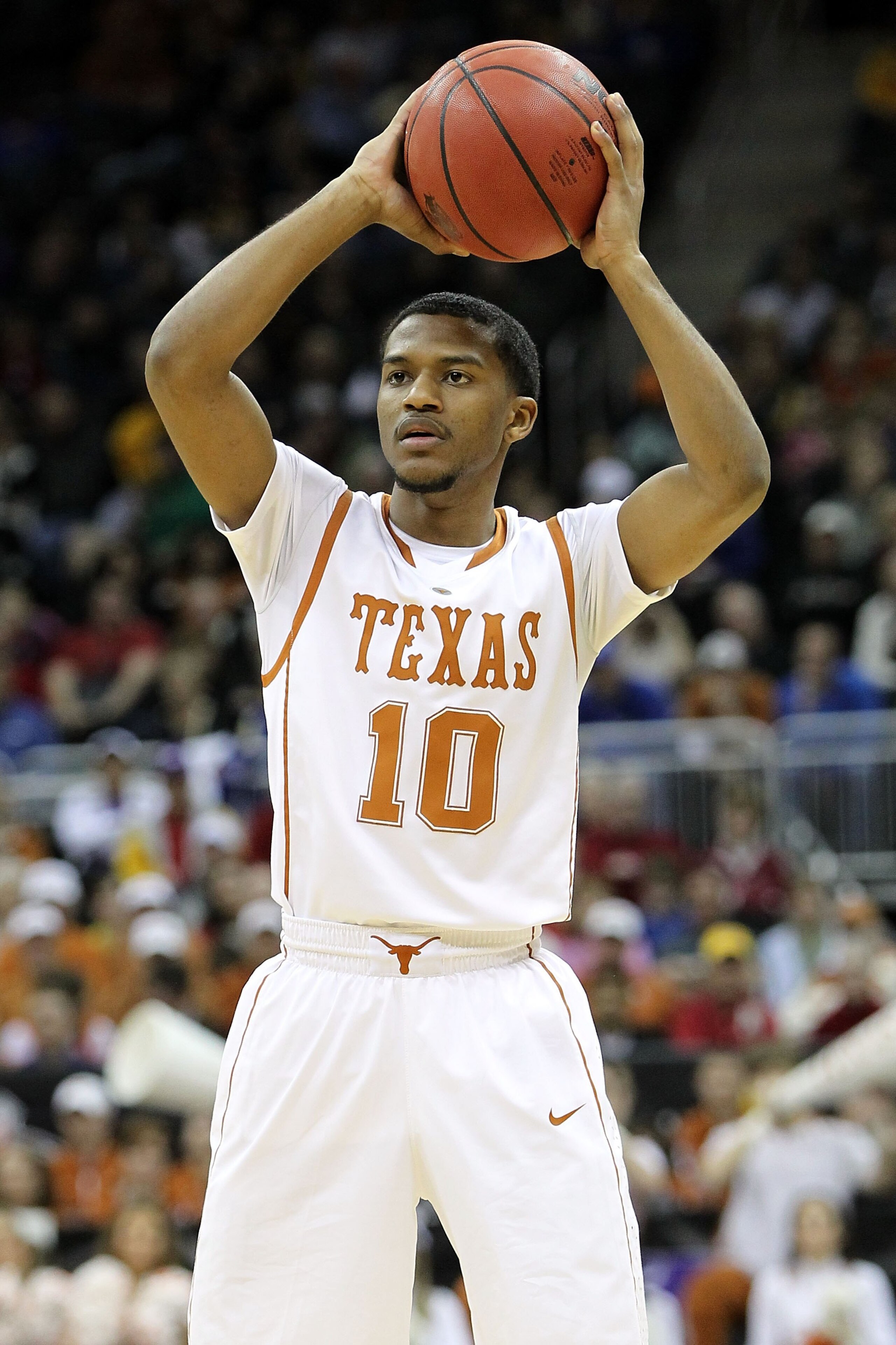 KANSAS CITY, MO - MARCH 10: Jai Lucas #10 of the Texas Longhorns looks to pass the ball against the Iowa State Cyclones during the first round game of the 2010 Phillips 66 Big 12 Men's Basketball Tournament at the Sprint Center on March 10, 2010 in Kansa KANSAS CITY, MO - MARCH 10: Jai Lucas #10 of the Texas Longhorns looks to pass the ball against the Iowa State Cyclones during the first round game of the 2010 Phillips 66 Big 12 Men's Basketball Tournament at the Sprint Center on March 10, 2010 in Kansa