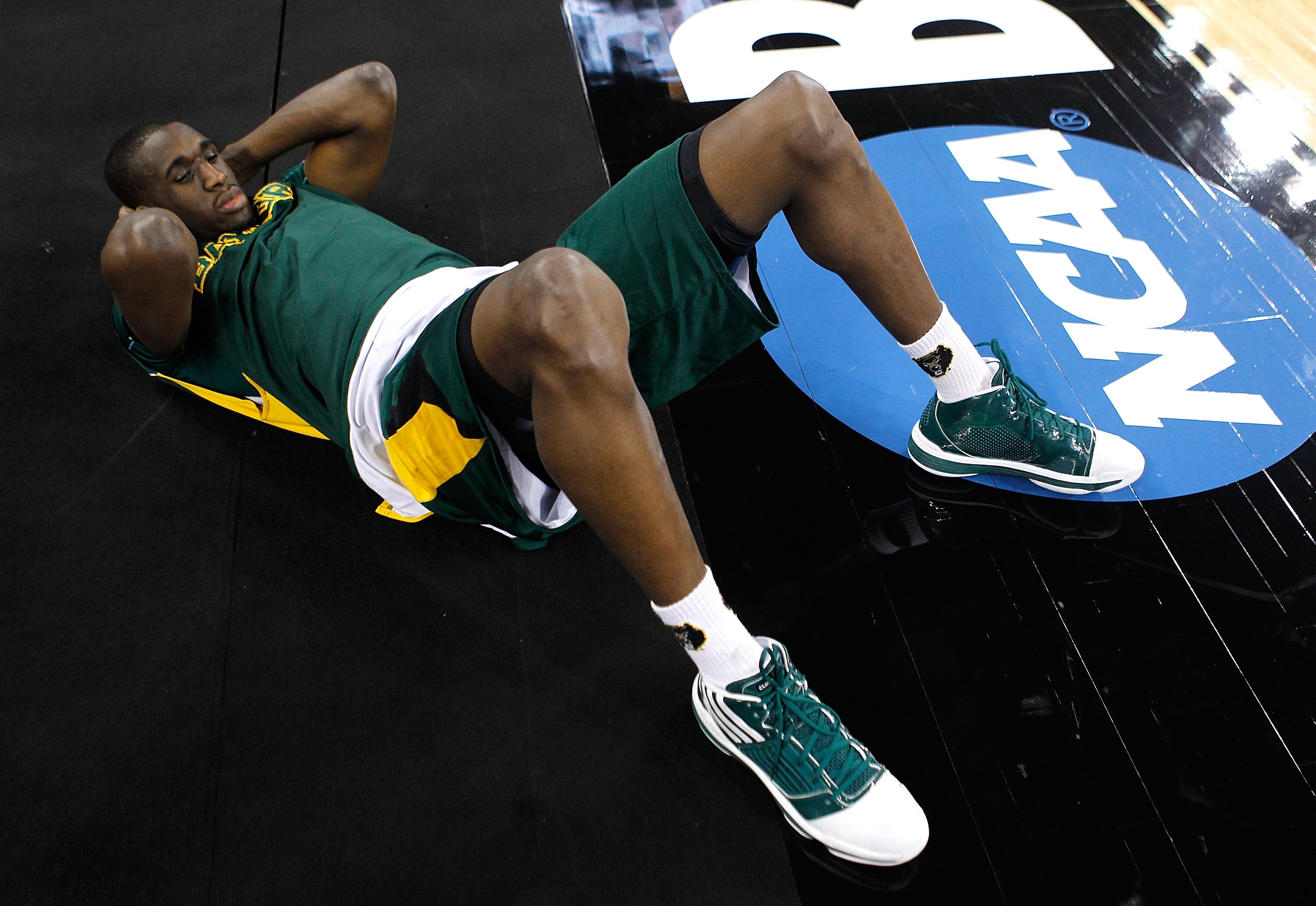 HOUSTON - MARCH 28: Ekpe Udoh #13 of the Baylor Bears relaxes in player warm-ups before Baylor takes on the Duke Blue Devils during the south regional final of the 2010 NCAA men's basketball tournament at Reliant Stadium on March 28, 2010 in Houston, Texa