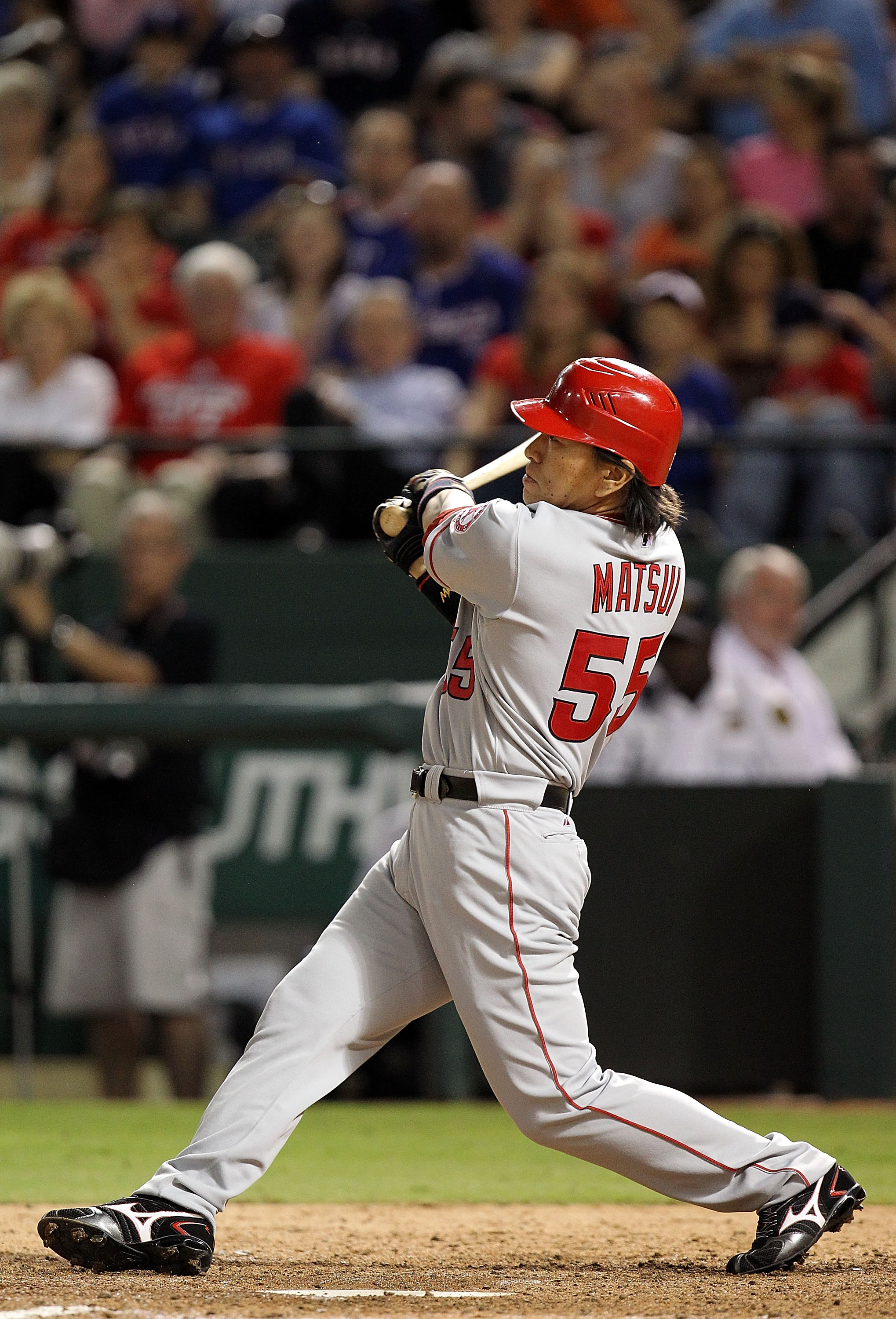 ARLINGTON, TX - OCTOBER 01:  Designated hitter Hideki Matsui #55 of the Los Angeles Angels of Anaheim singles in the 9th inning against the Texas Rangers at Rangers Ballpark in Arlington on October 1, 2010 in Arlington, Texas.  (Photo by Ronald Martinez/G