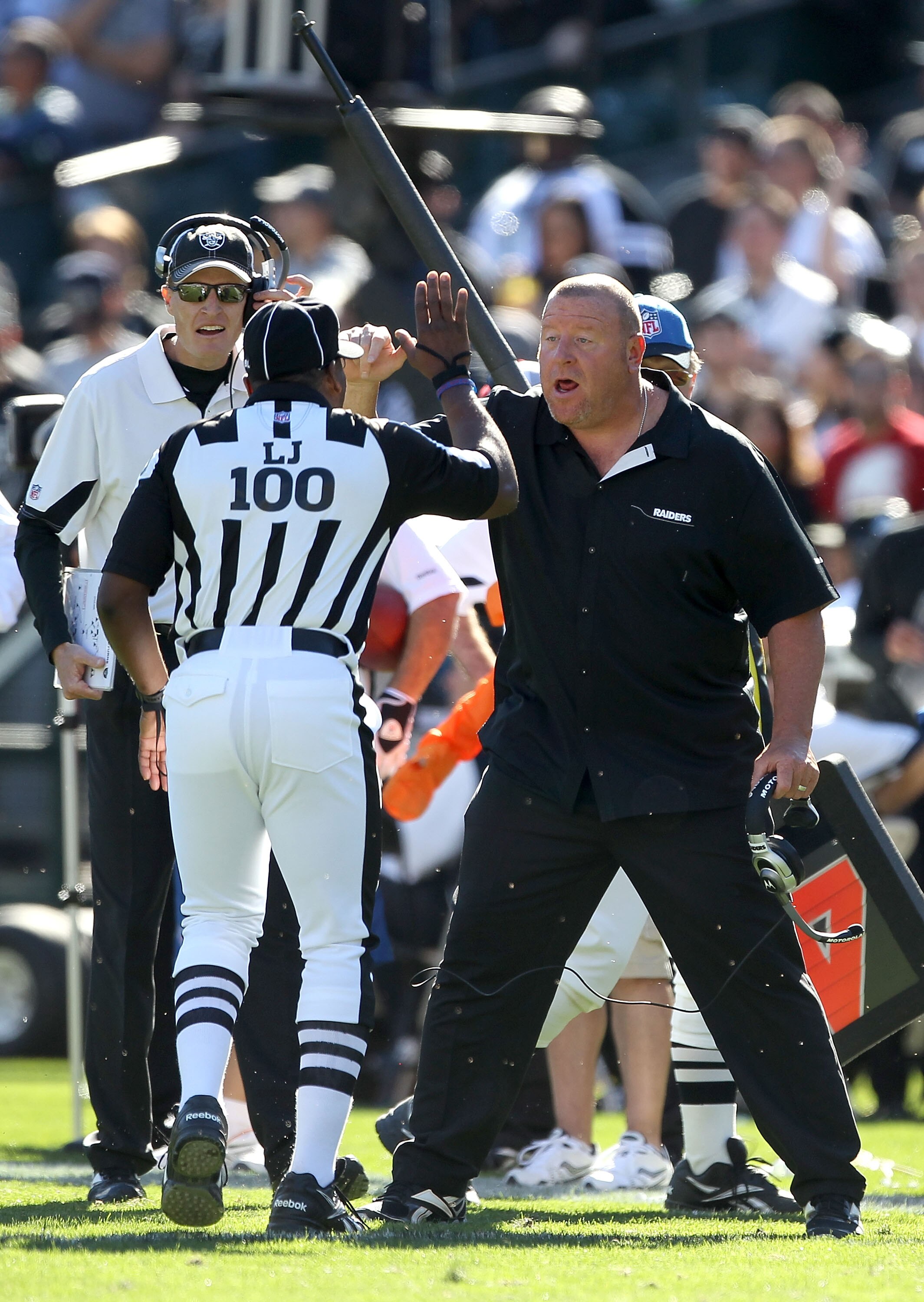 OAKLAND, CA - OCTOBER 31:  Head coach Tom Cable of the Oakland Raiders argues with field judge Tom Symonette during their game against the Seattle Seahawks at Oakland-Alameda County Coliseum on October 31, 2010 in Oakland, California.  (Photo by Ezra Shaw