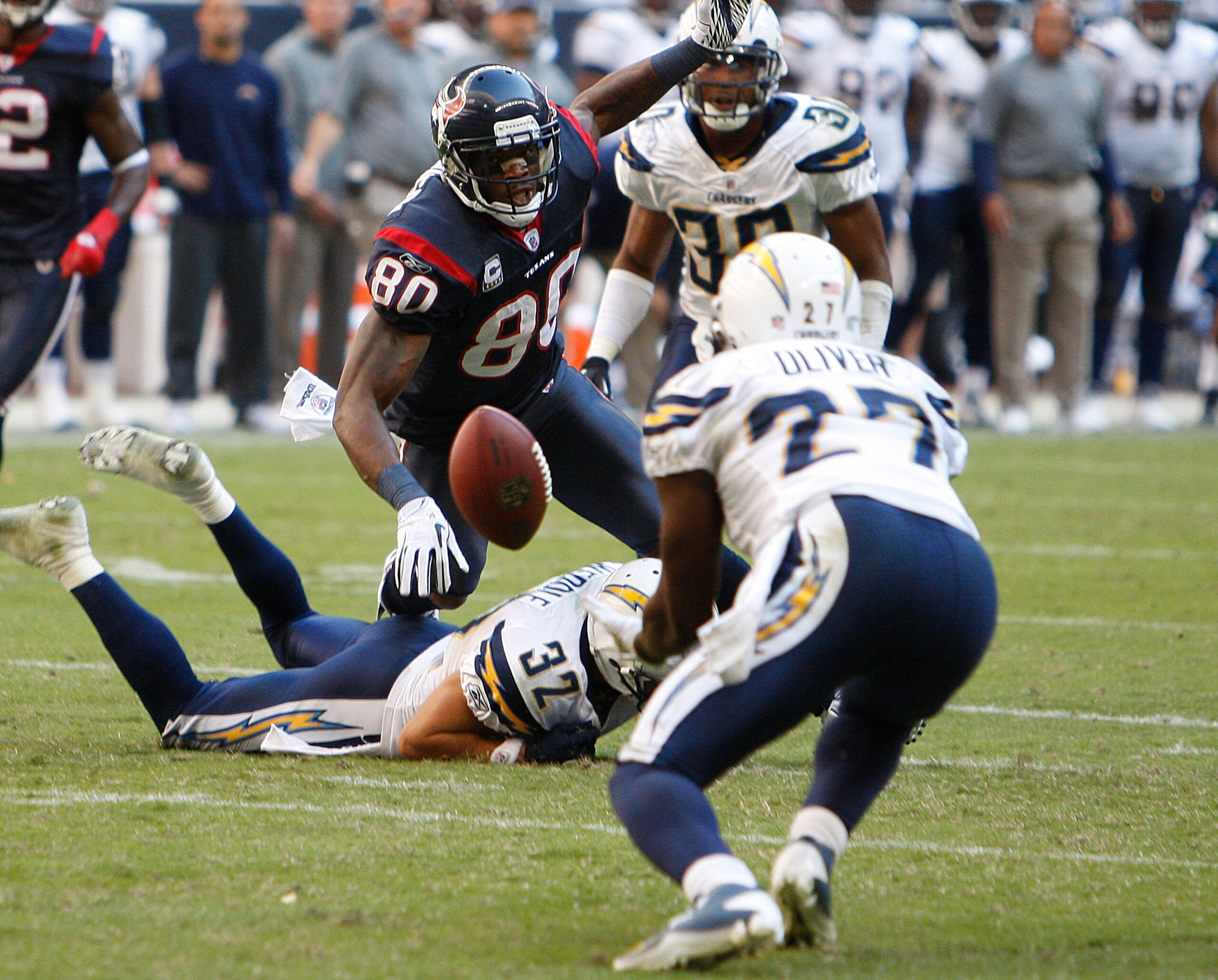 HOUSTON - NOVEMBER 07: Wide receiver Andre Johnson #80 of the Houston Texans loses the ball as strong safety Paul Oliver #27 of the San Diego Chargers interecepts the ball at Reliant Stadium on November 7, 2010 in Houston, Texas. (Photo by Bob Levey/Ge HOUSTON - NOVEMBER 07: Wide receiver Andre Johnson #80 of the Houston Texans loses the ball as strong safety Paul Oliver #27 of the San Diego Chargers interecepts the ball at Reliant Stadium on November 7, 2010 in Houston, Texas. (Photo by Bob Levey/Ge
