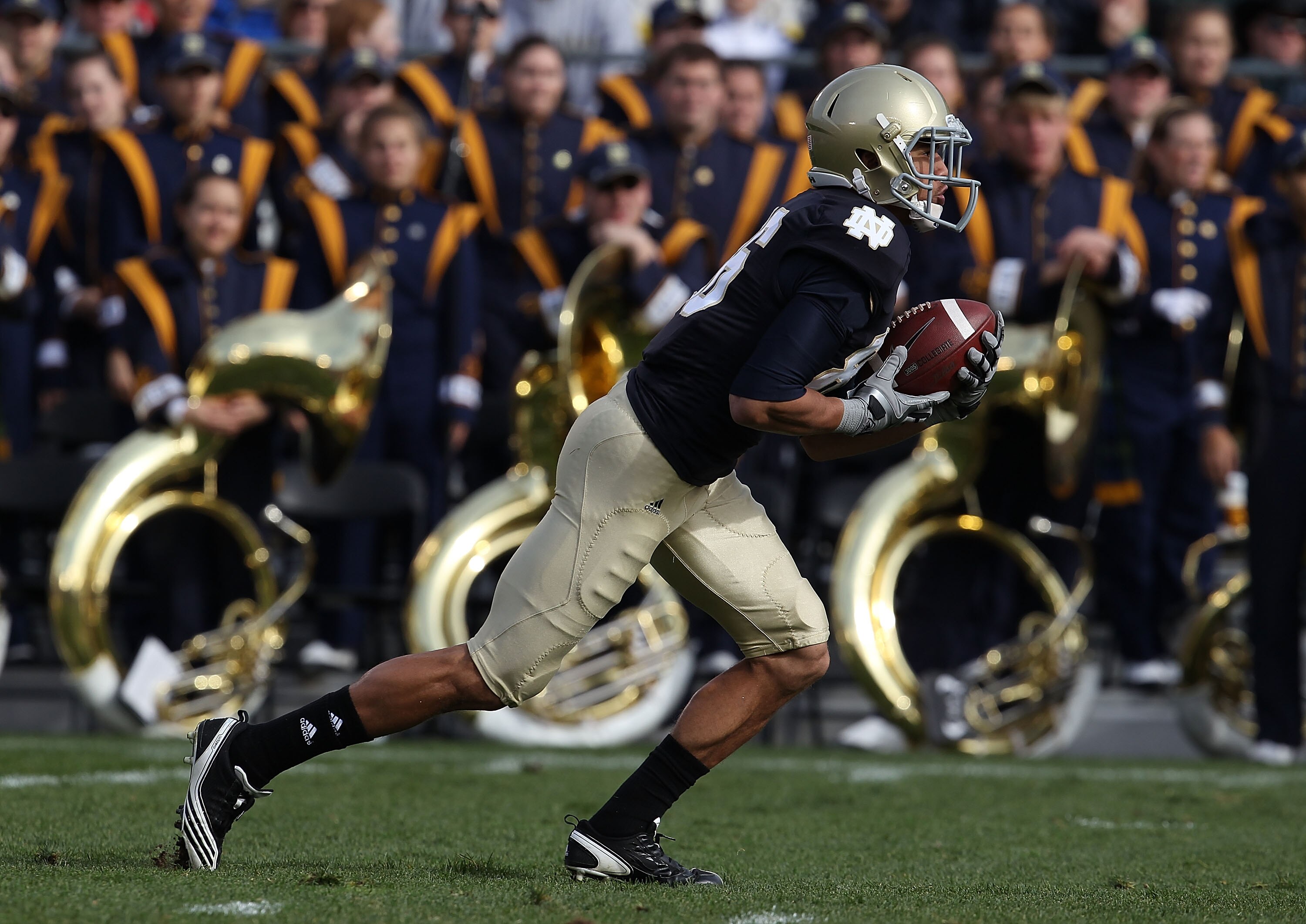 SOUTH BEND, IN - OCTOBER 30: Bennett Jackson #86 of the Notre Dame Fighting Irish fields a kick against the Tulsa Golden Hurricane at Notre Dame Stadium on October 30, 2010 in South Bend, Indiana. Tulsa defeated Notre Dame 28-27. (Photo by Jonathan Daniel