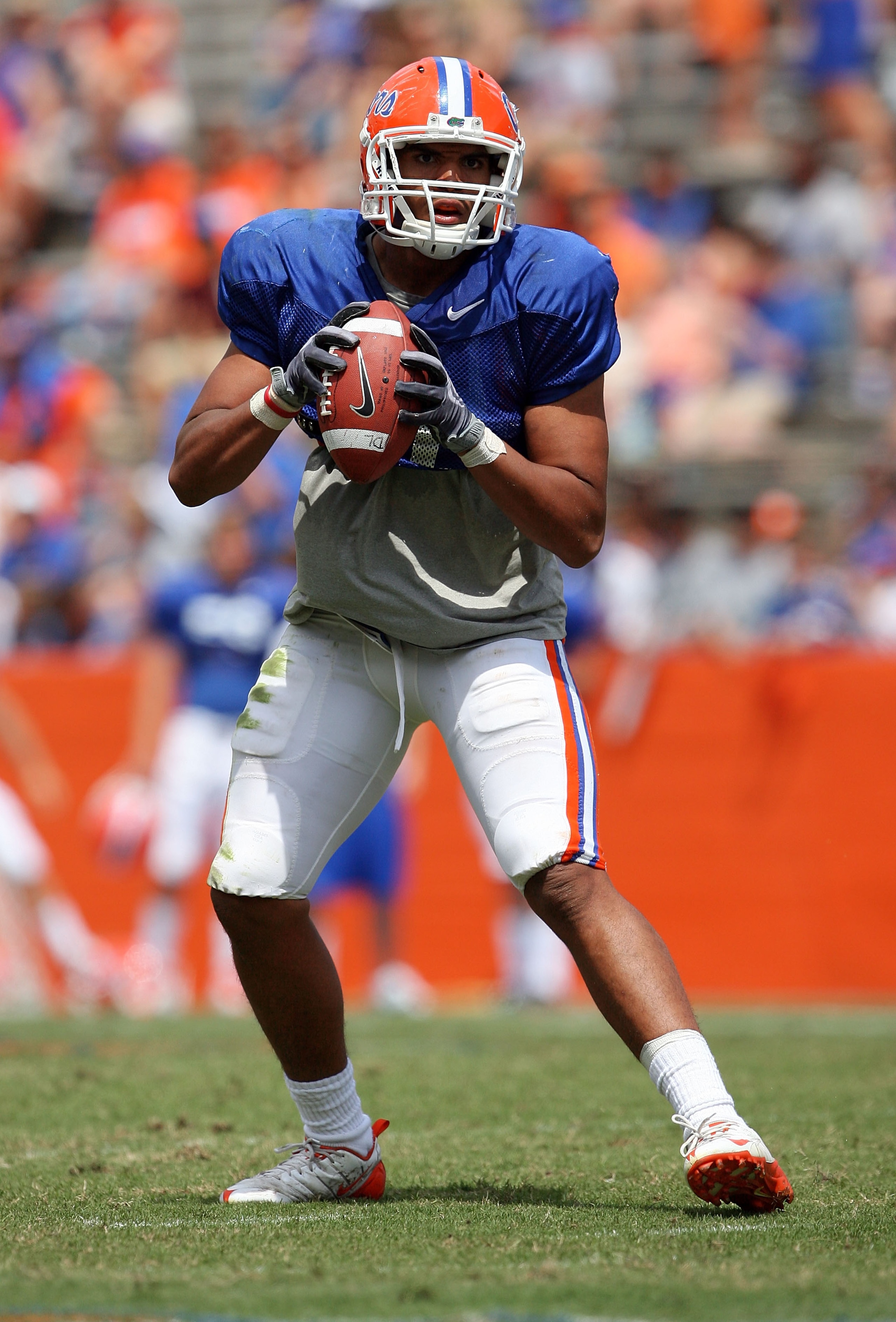 GAINESVILLE, FL - APRIL 10:  Quarterback Jordan Reed #11 of the Florida Gators drops back to pass during the Orange & Blue game at Ben Hill Griffin Stadium on April 10, 2010 in Gainesville, Florida.  (Photo by Doug Benc/Getty Images)