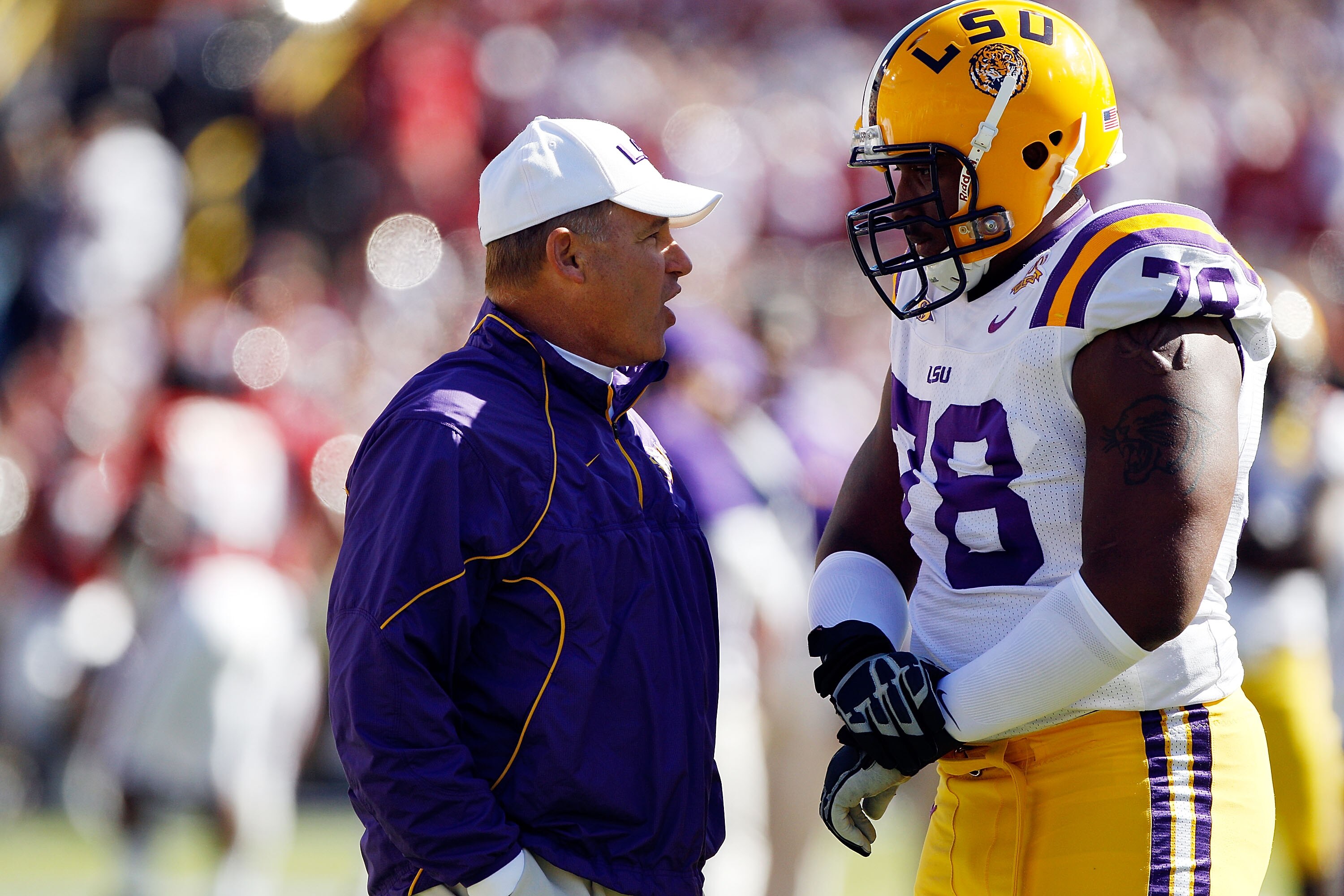 BATON ROUGE, LA - NOVEMBER 06: Head coach Les Miles of the Louisiana State University Tigers watches pregame before playing the Alabama Crimson Tide at Tiger Stadium on November 6, 2010 in Baton Rouge, Louisiana. (Photo by Chris Graythen/Getty Images) BATON ROUGE, LA - NOVEMBER 06: Head coach Les Miles of the Louisiana State University Tigers watches pregame before playing the Alabama Crimson Tide at Tiger Stadium on November 6, 2010 in Baton Rouge, Louisiana. (Photo by Chris Graythen/Getty Images)