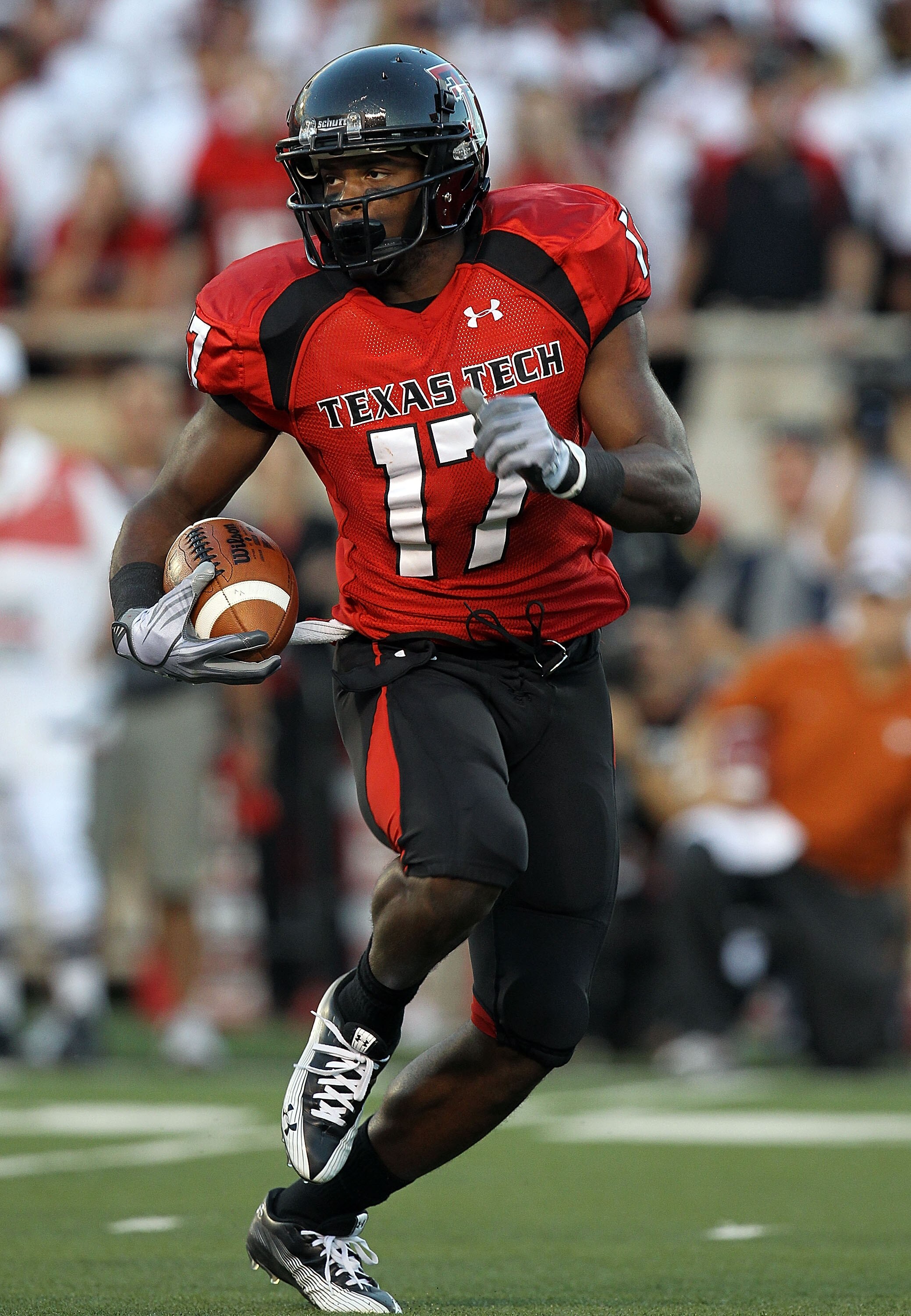 LUBBOCK, TX - SEPTEMBER 18: Detron Lewis #17 of the Texas Tech Red Raiders runs the ball against the Texas Longhorns at Jones AT&T Stadium on September 18, 2010 in Lubbock, Texas. (Photo by Ronald Martinez/Getty Images) LUBBOCK, TX - SEPTEMBER 18: Detron Lewis #17 of the Texas Tech Red Raiders runs the ball against the Texas Longhorns at Jones AT&T Stadium on September 18, 2010 in Lubbock, Texas. (Photo by Ronald Martinez/Getty Images)