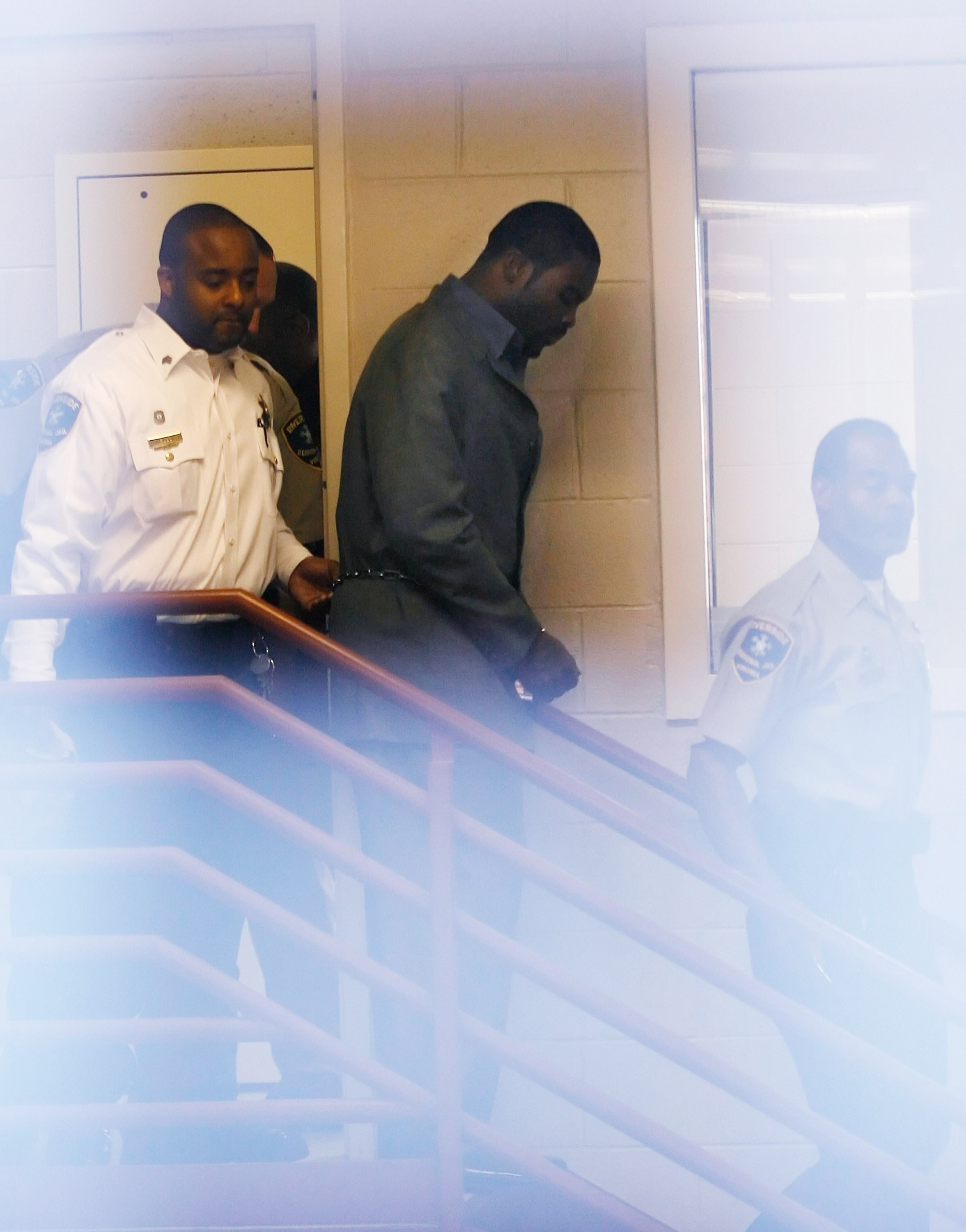 Sussex, VA - NOVEMBER 25:  Suspended Atlanta Falcons quarterback Michael Vick (C) leaves Surry County Circuit Court after entering a guilty plea on two felony counts connected to dog fighting on November 25, 2008 in Sussex, Virginia. Under a plea agreemen