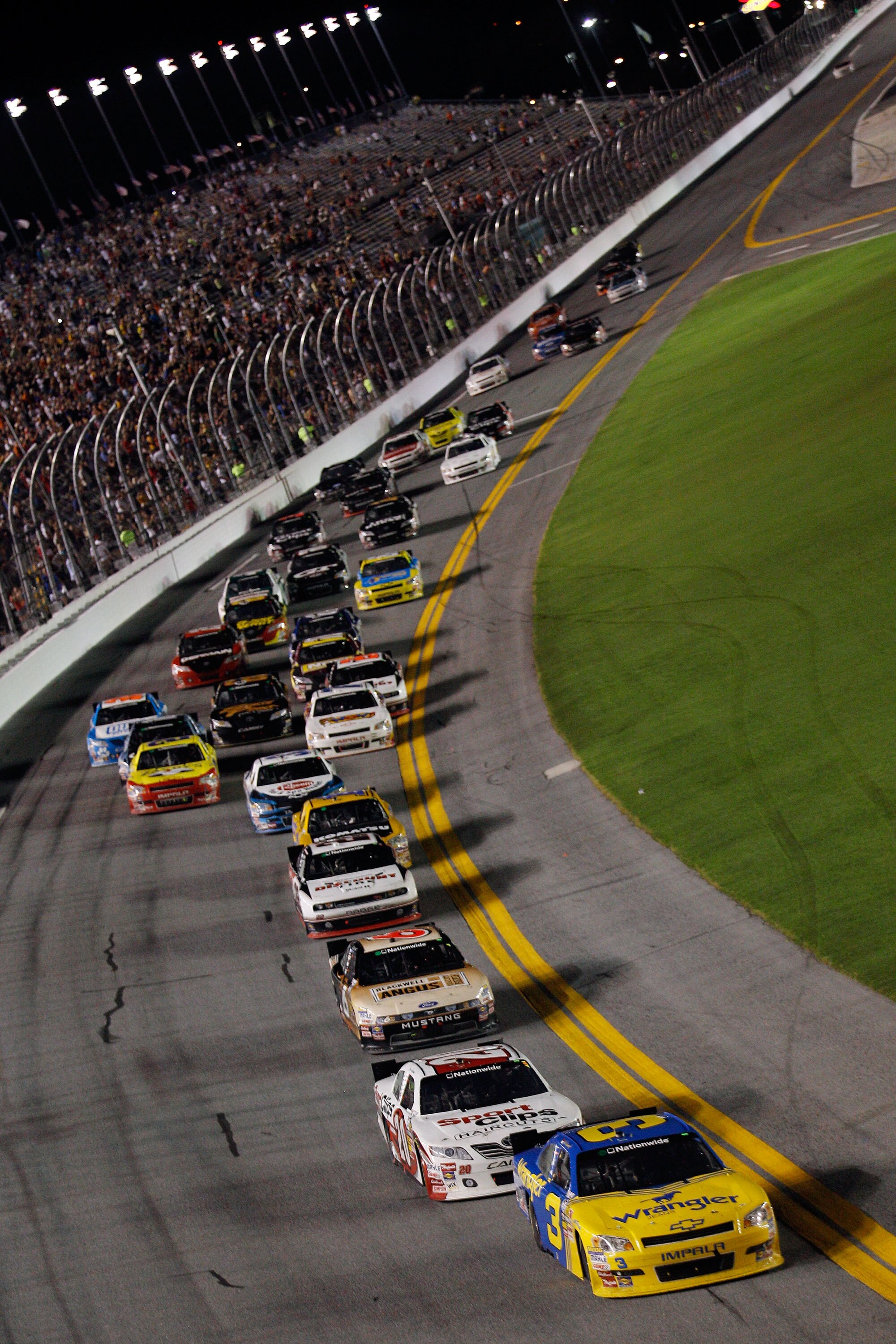 DAYTONA BEACH, FL - JULY 02:  Dale Earnhardt Jr., driver of the #3 Wrangler Chevrolet leads the field near the end of the race during the NASCAR Nationwide Series Subway Jalapeno 250 at Daytona International Speedway on July 2, 2010 in Daytona Beach, Flor