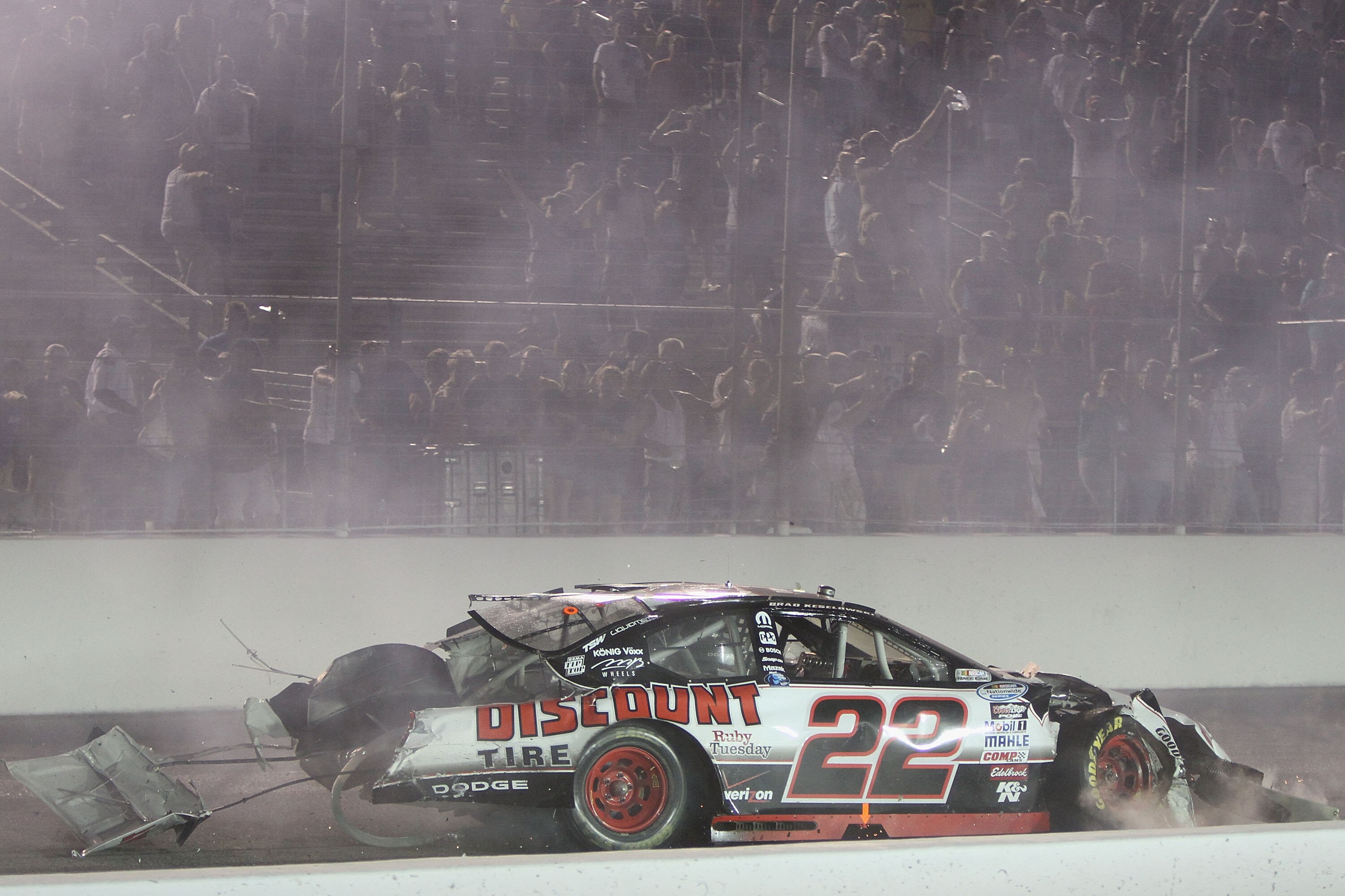MADISON, IL - JULY 17: Brad Keselowski driver of the #22 Discount Tire Dodge wrecks on the final lap of the NASCAR Nationwide Series Missouri-Illinois Dodge Dealers 250 at Gateway International Raceway on July 17, 2010 in Madison, Illinois.  (Photo by Dil