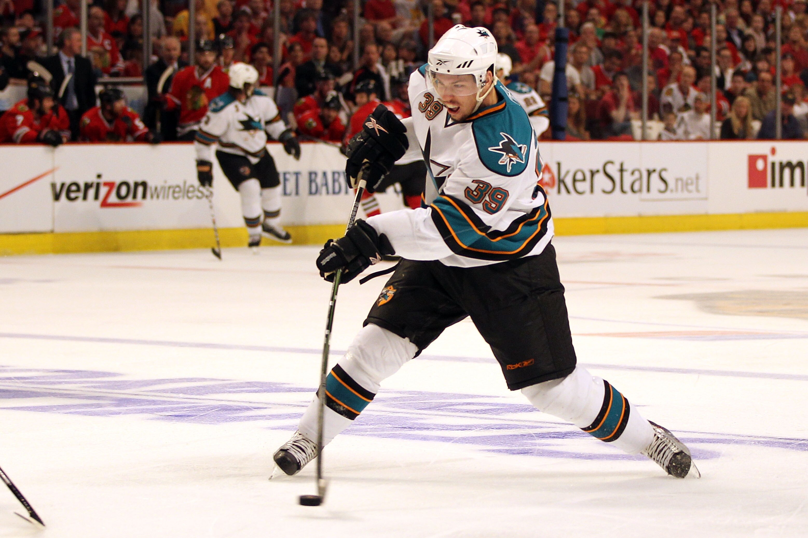 CHICAGO - MAY 23: Logan Couture #39 of the San Jose Sharks shoots the puck in the second period while taking on the Chicago Blackhawks in Game Four of the Western Conference Finals during the 2010 NHL Stanley Cup Playoffs at the United Center on May 23, CHICAGO - MAY 23: Logan Couture #39 of the San Jose Sharks shoots the puck in the second period while taking on the Chicago Blackhawks in Game Four of the Western Conference Finals during the 2010 NHL Stanley Cup Playoffs at the United Center on May 23,