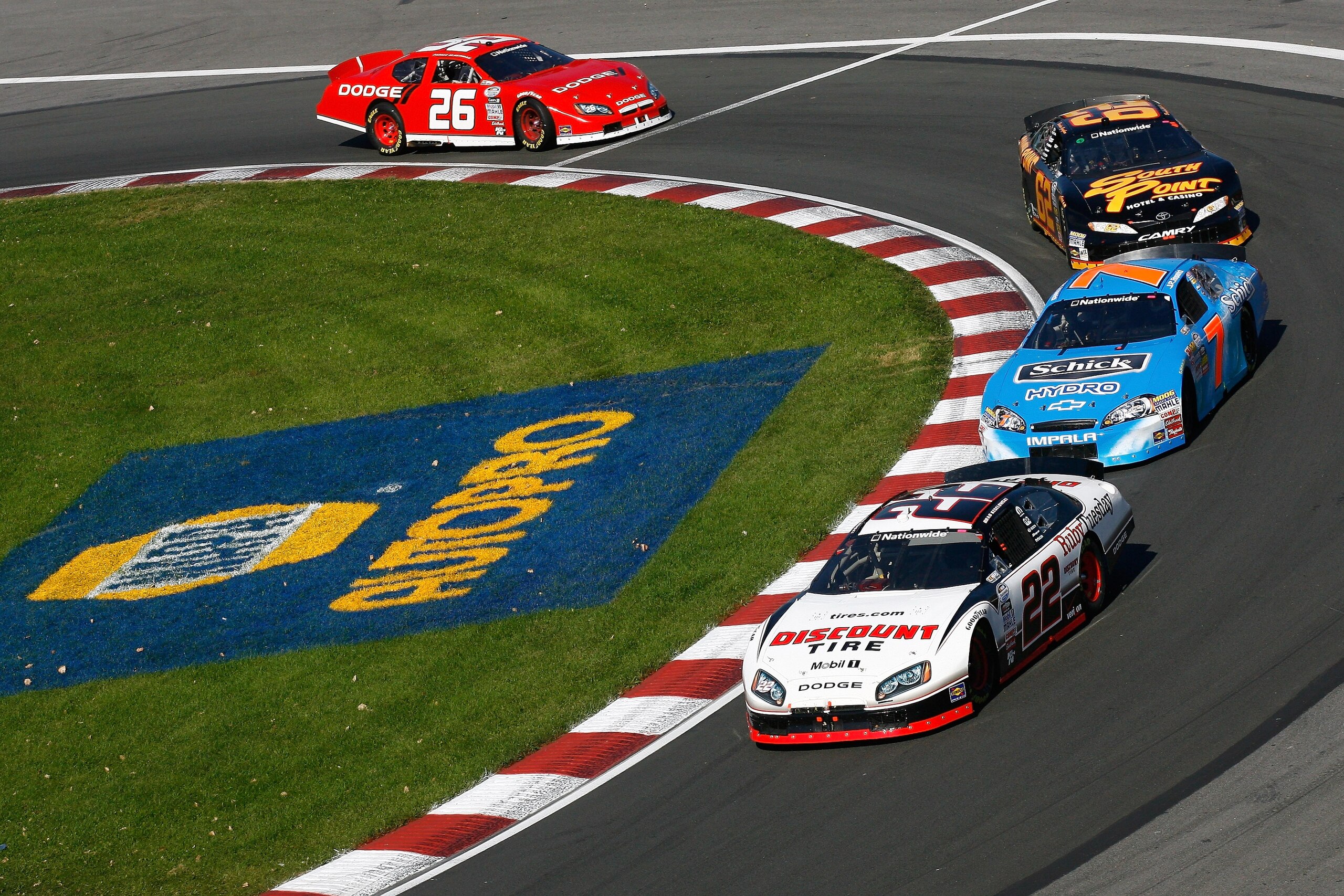 MONTREAL, QC - AUGUST 29: Brad Keselowski, driver of the #22 Ruby Tuesday's Dodge leads a pack of cars during the NASCAR Nationwide Series Napa Auto Parts 200 on August 29, 2010 at the Circuit Gilles Villeneuve in Montreal, Quebec, Canada. (Photo by Jason
