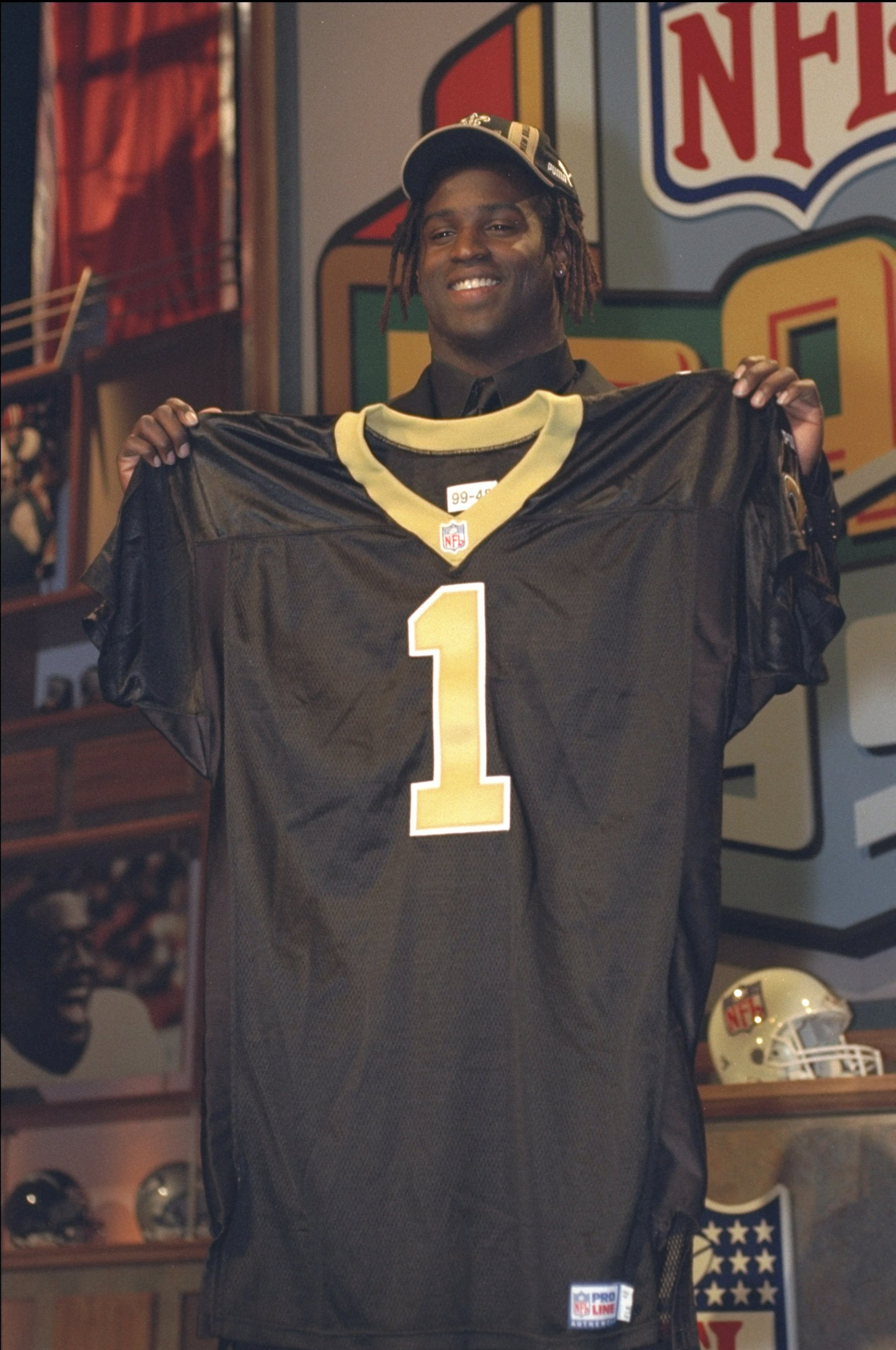 17 Apr 1999: The fifth draft pick Ricky Williams holds his new New Orleans Saints jersey during the NFL Draft at the Madison Square Garden in New York, New York. 17 Apr 1999: The fifth draft pick Ricky Williams holds his new New Orleans Saints jersey during the NFL Draft at the Madison Square Garden in New York, New York.