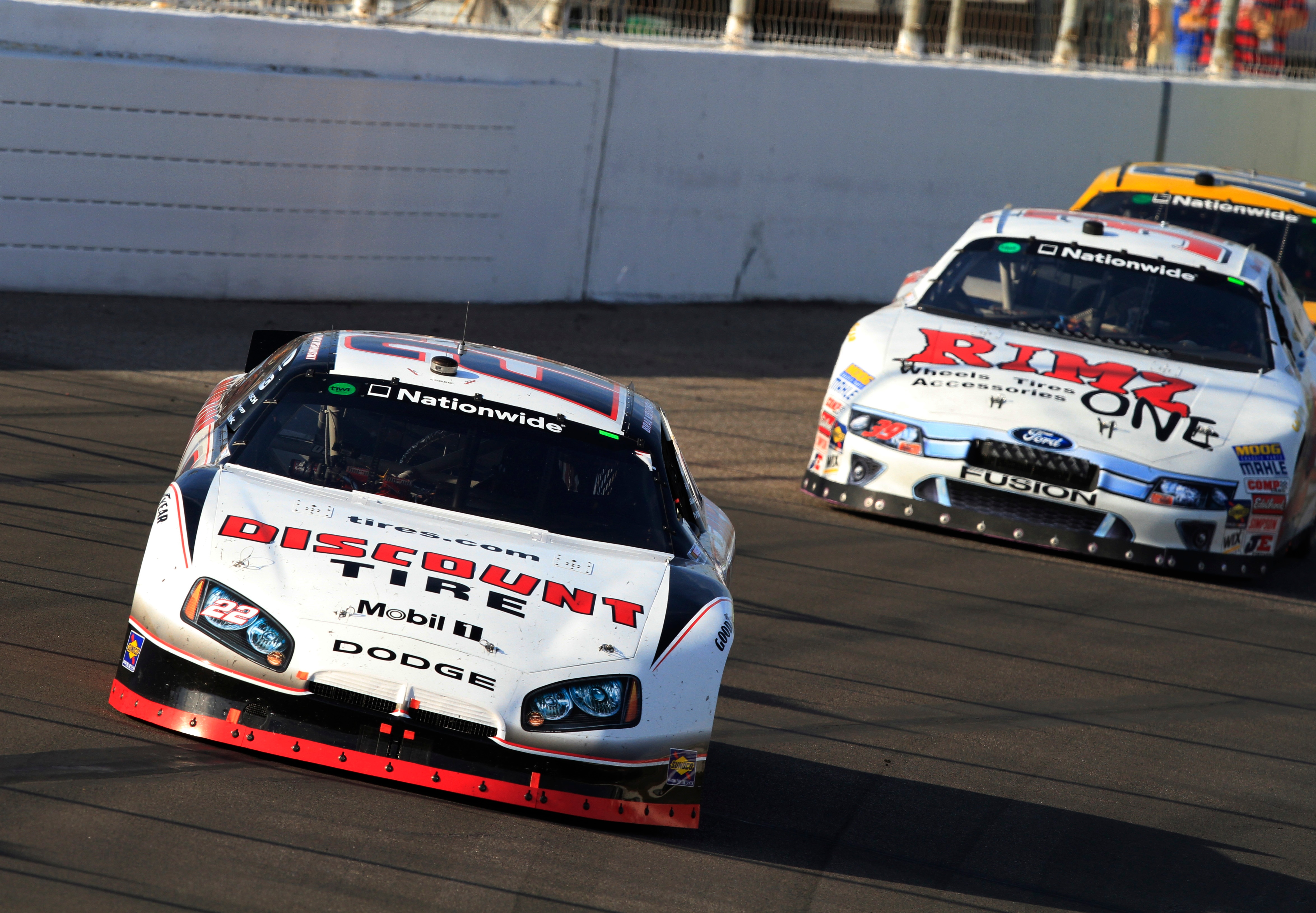 MADISON, IL - OCTOBER 23: Brad Keselowski, driver of the #22 Discount Tire Dodge leads the field during the NASCAR 5-hour Energy 250 at Gateway International Raceway on October 23, 2010 in Madison, Illinois.  (Photo by John Sommers II/Getty Images)