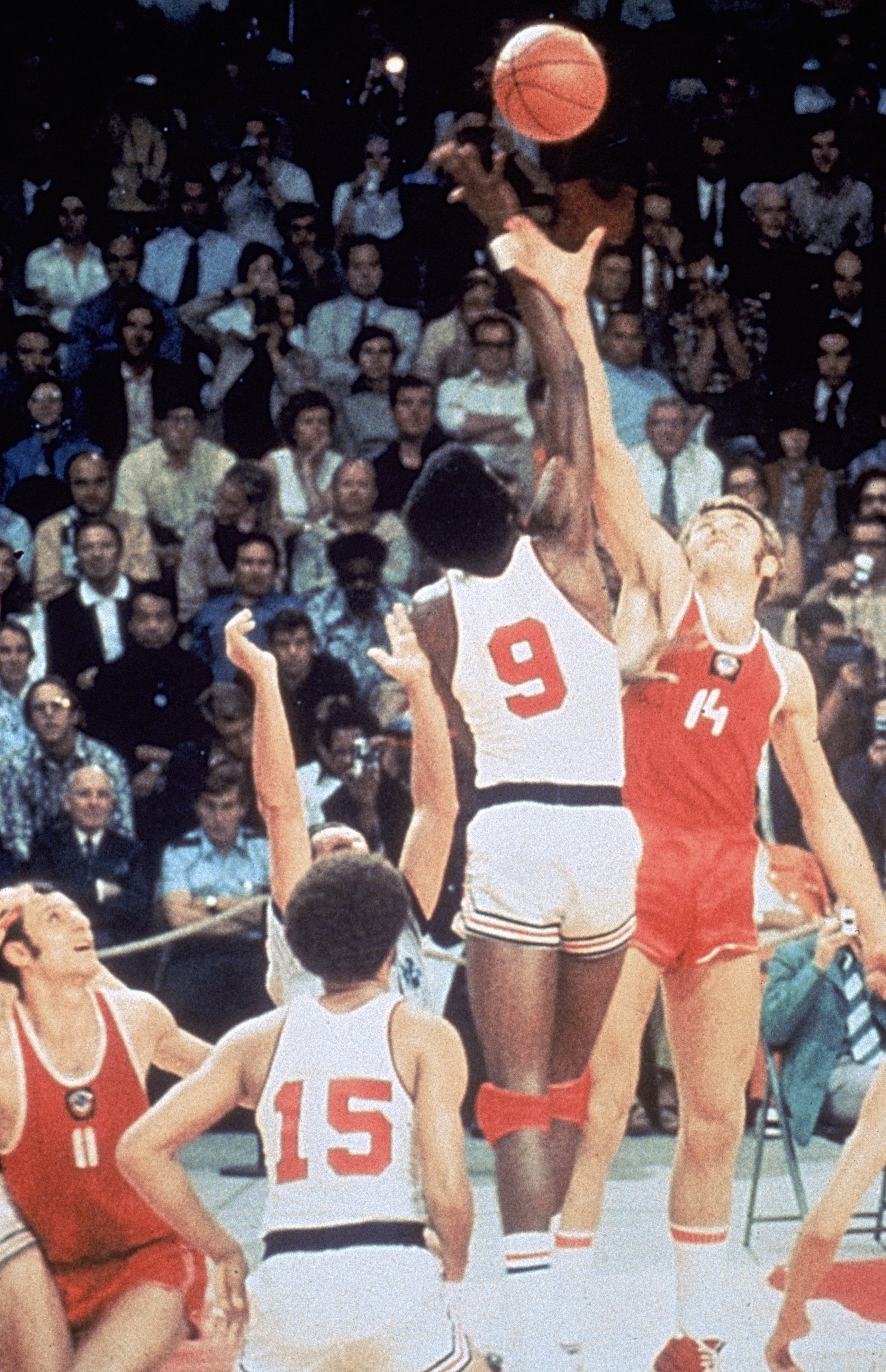 MUNICH, GERMANY - SEPTEMBER 10: USA Basketball team battles for the tip off against the Russia basketball team on September 10, 1972 in Munich, Germany. The Russia won this controversial game 51 to 50 after being given extra time to get a final shot off. MUNICH, GERMANY - SEPTEMBER 10: USA Basketball team battles for the tip off against the Russia basketball team on September 10, 1972 in Munich, Germany. The Russia won this controversial game 51 to 50 after being given extra time to get a final shot off.