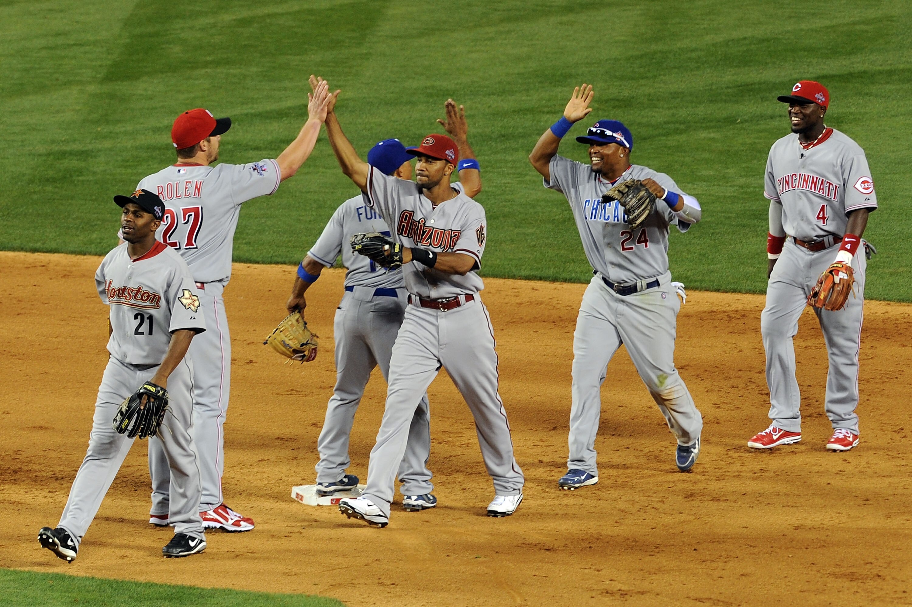 ANAHEIM, CA - JULY 13:  National League All-Star Michael Bourn #21 of the Houston Astros, National League All-Star Scott Rolen #27 of the Cincinnati Reds, National League All-Star Rafael Furcal #15 of the Los Angeles Dodgers,  National League All-Star Chr