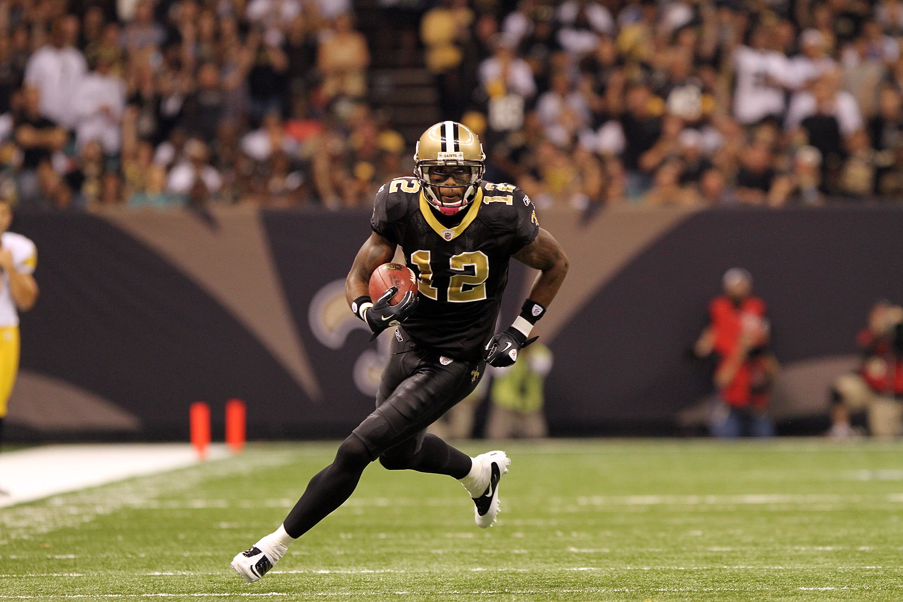 NEW ORLEANS, LA - OCTOBER 31: Marques Colston #12 of the New Orleans Saints in action during the game against the Pittsburgh Steelers at the Louisiana Superdome on October 31, 2010 in New Orleans, Louisiana. (Photo by Matthew Sharpe/Getty Images)