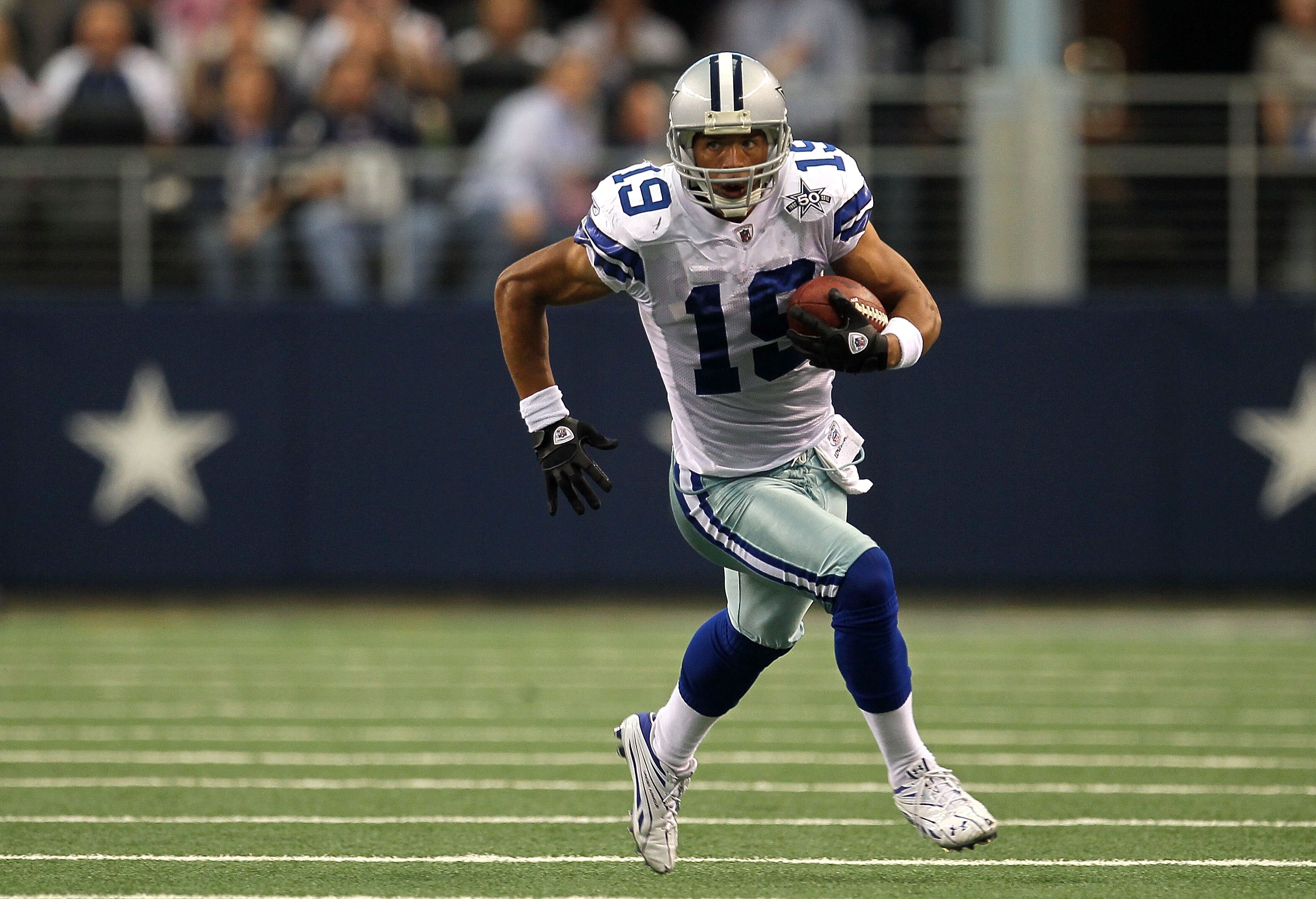 ARLINGTON, TX - OCTOBER 31:  Miles Austin #19 of the Dallas Cowboys runs for yards after the catch against the Jacksonville Jaguars at Cowboys Stadium on October 31, 2010 in Arlington, Texas.  (Photo by Stephen Dunn/Getty Images)