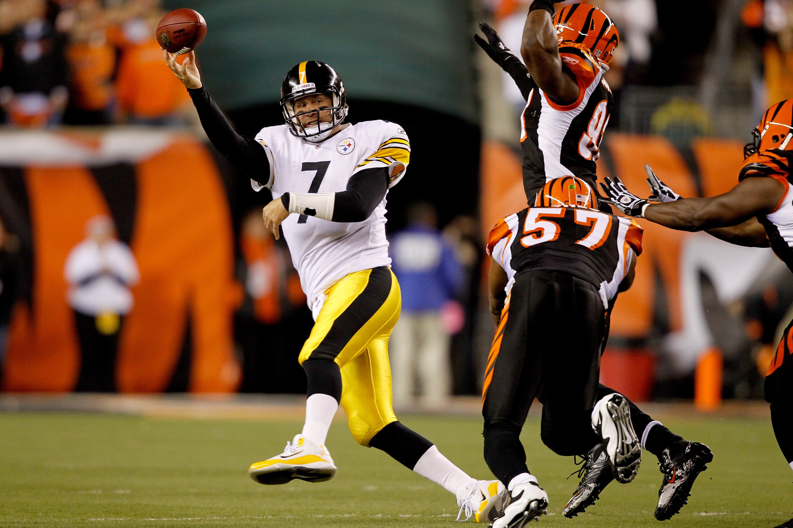 CINCINNATI - NOVEMBER 08:  Quarterback Ben Roethlisberger #7 of the Pittsburgh Steelers throws under pressure while playing the Cincinnati Bengals at Paul Brown Stadium on November 8, 2010 in Cincinnati, Ohio.  The Steelers defeated the Bengals 27-21. (Ph