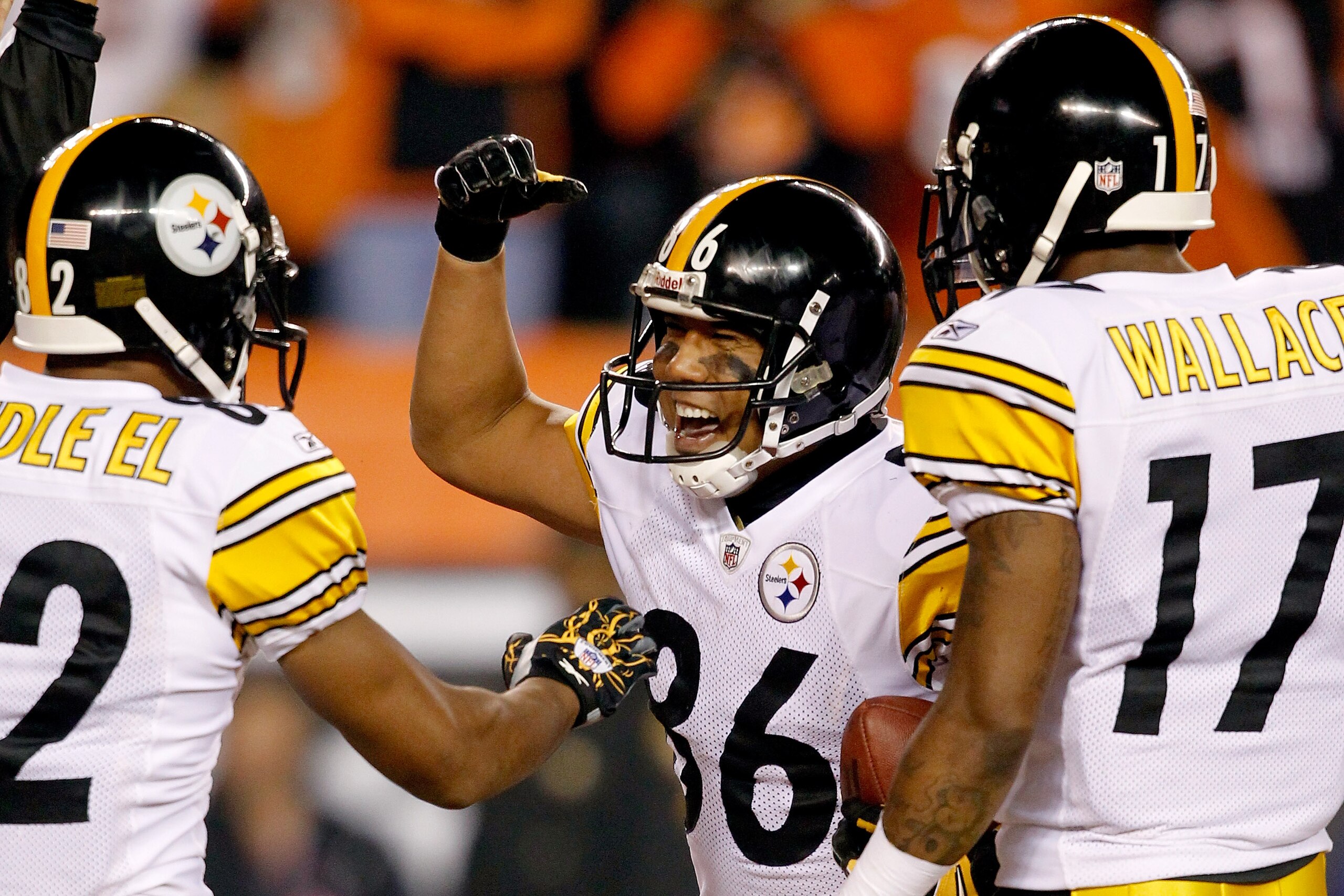 CINCINNATI - NOVEMBER 08:  Hines Ward #86 of the Pittsburgh Steelers celebrates in the endzone with Antwaan Randle El #82 and Mike Wallace #17 after scoring a touchdown against the Cincinnati Bengals at Paul Brown Stadium on November 8, 2010 in Cincinnati