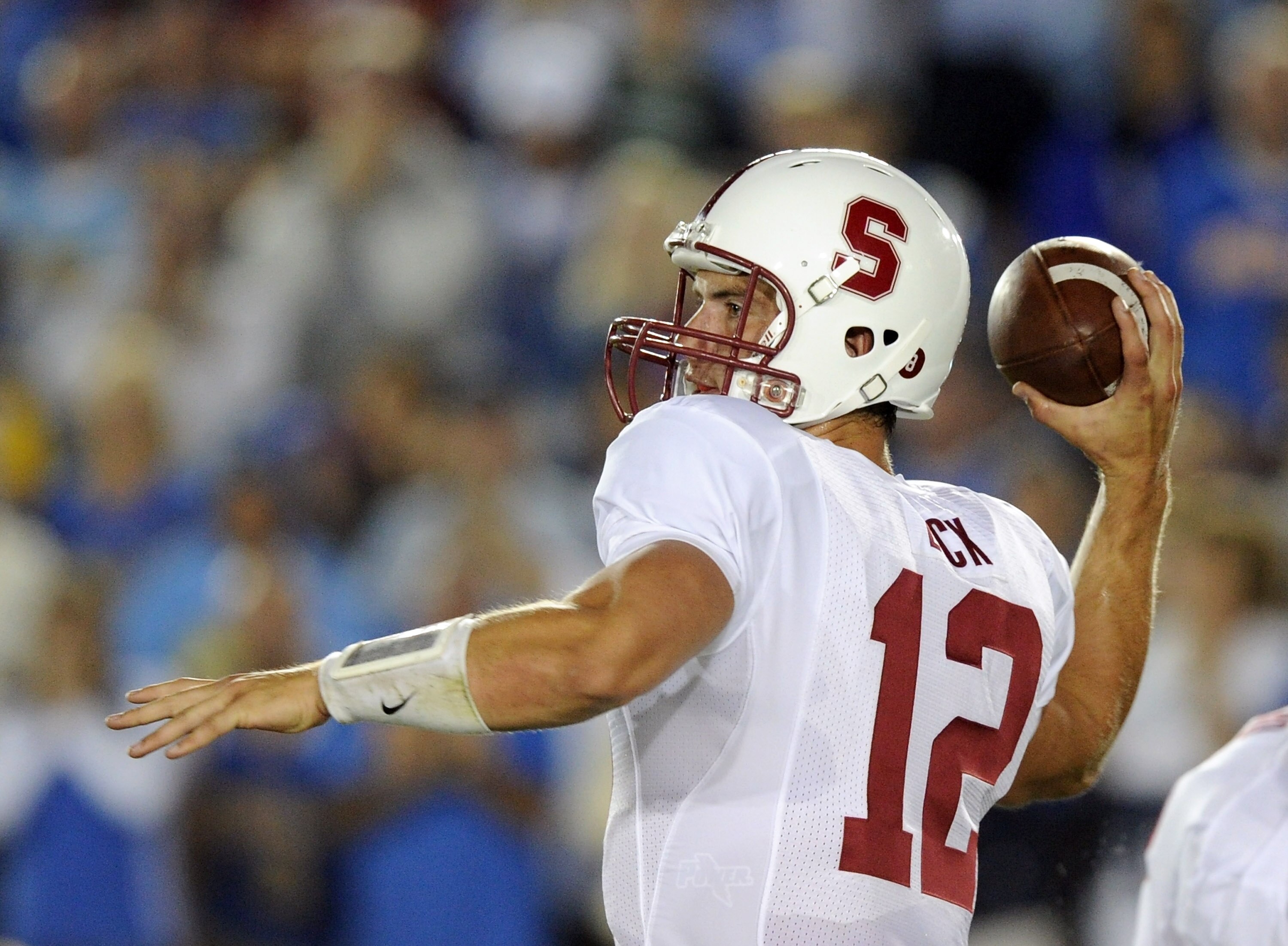 PASADENA, CA - SEPTEMBER 11:  Andrew Luck #12 of Stanford passes in the pocket against UCLA during the game at the Rose Bowl on September 11, 2010 in Pasadena, California.  (Photo by Harry How/Getty Images)