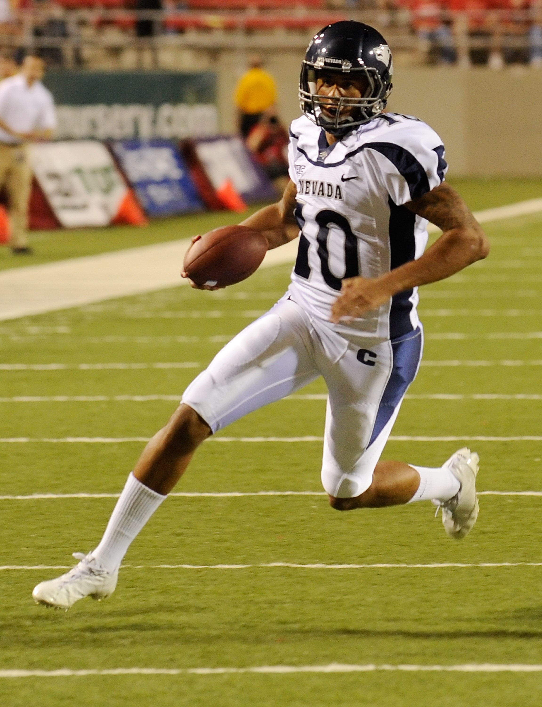 LAS VEGAS - OCTOBER 02:  Quarterback Colin Kaepernick #10 of the Nevada Reno Wolf Pack runs for a touchdown against the UNLV Rebels in the first quarter of their game at Sam Boyd Stadium October 2, 2010 in Las Vegas, Nevada. Nevada Reno won 44-26.  (Photo