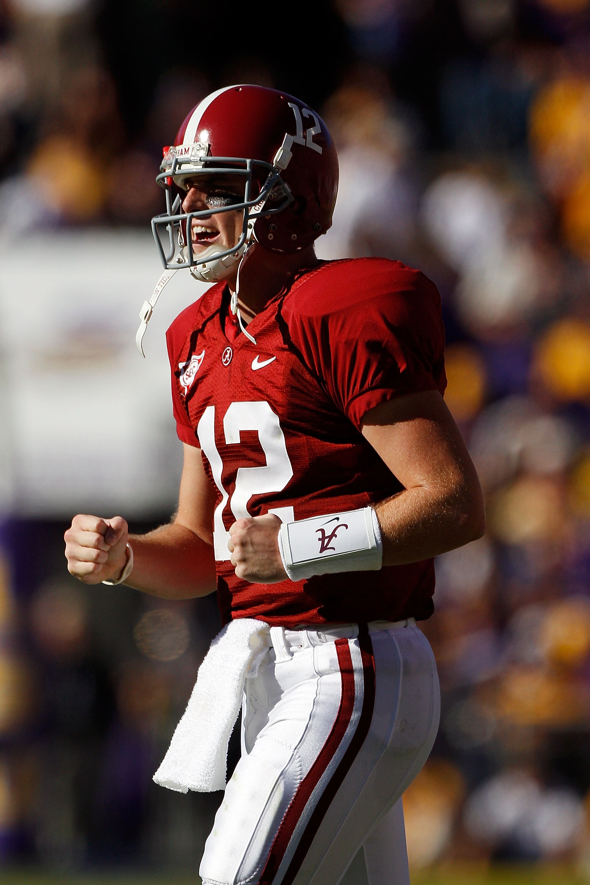 BATON ROUGE, LA - NOVEMBER 06:  Quarterback Greg McElroy #12 of the Alabama Crimson Tide celebrates after scoring against the Louisiana State University Tigers at Tiger Stadium on November 6, 2010 in Baton Rouge, Louisiana.  (Photo by Chris Graythen/Getty