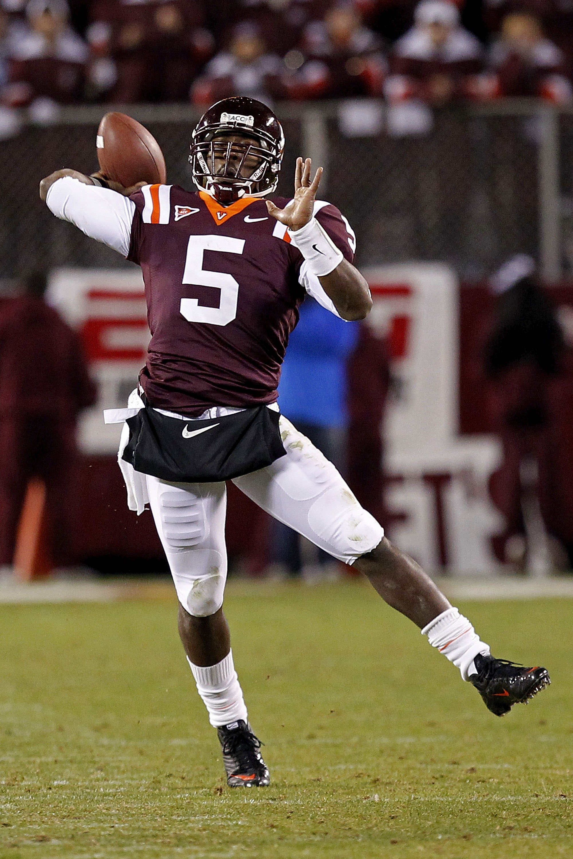 BLACKSBURG, VA - NOVEMBER 04:  Quarterback Tyrod Taylor #5 of the Virginia Tech Hokies throws the ball against the Georgia Tech Yellow Jackets at Lane Stadium on November 4, 2010 in Blacksburg, Virginia.  (Photo by Geoff Burke/Getty Images)
