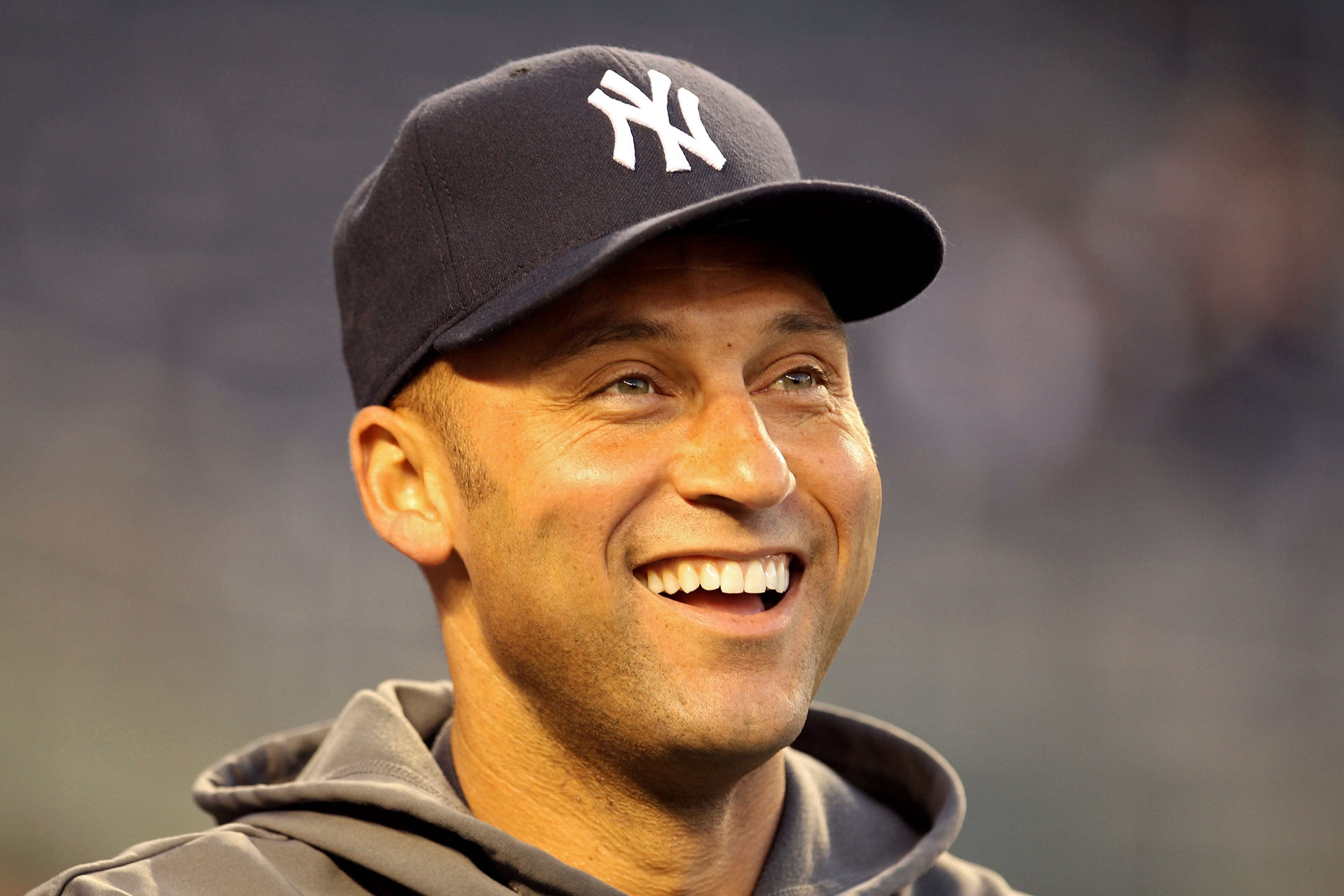 NEW YORK - OCTOBER 19:  Derek Jeter #2 of the New York Yankees smiles during batting practice against the Texas Rangers in Game Four of the ALCS during the 2010 MLB Playoffs at Yankee Stadium on October 19, 2010 in the Bronx borough of New York City.  (Ph