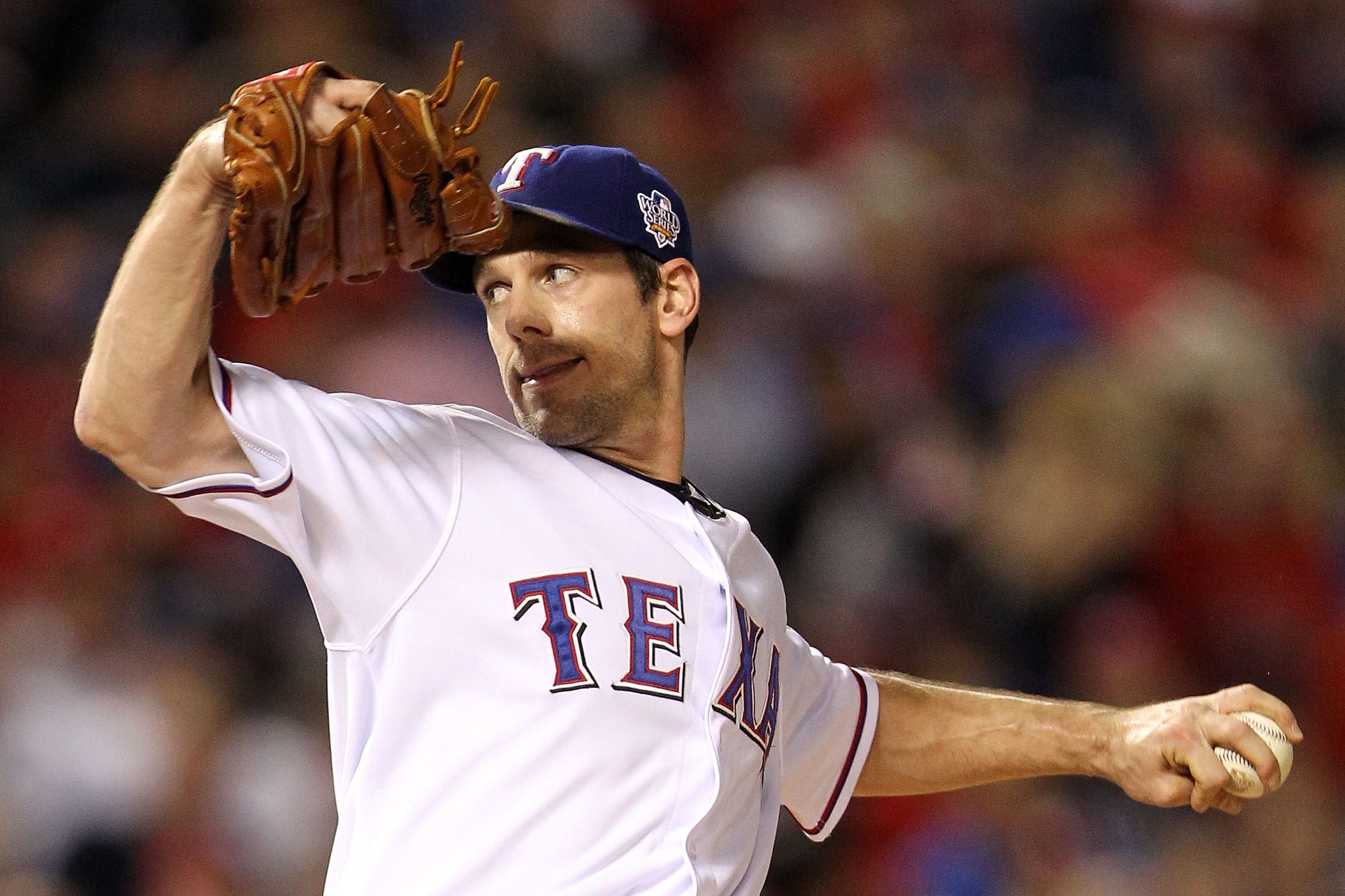 ARLINGTON, TX - NOVEMBER 01:  Cliff Lee #33 of the Texas Rangers pitches against the San Francisco Giants in Game Five of the 2010 MLB World Series at Rangers Ballpark in Arlington on November 1, 2010 in Arlington, Texas.  (Photo by Ronald Martinez/Getty