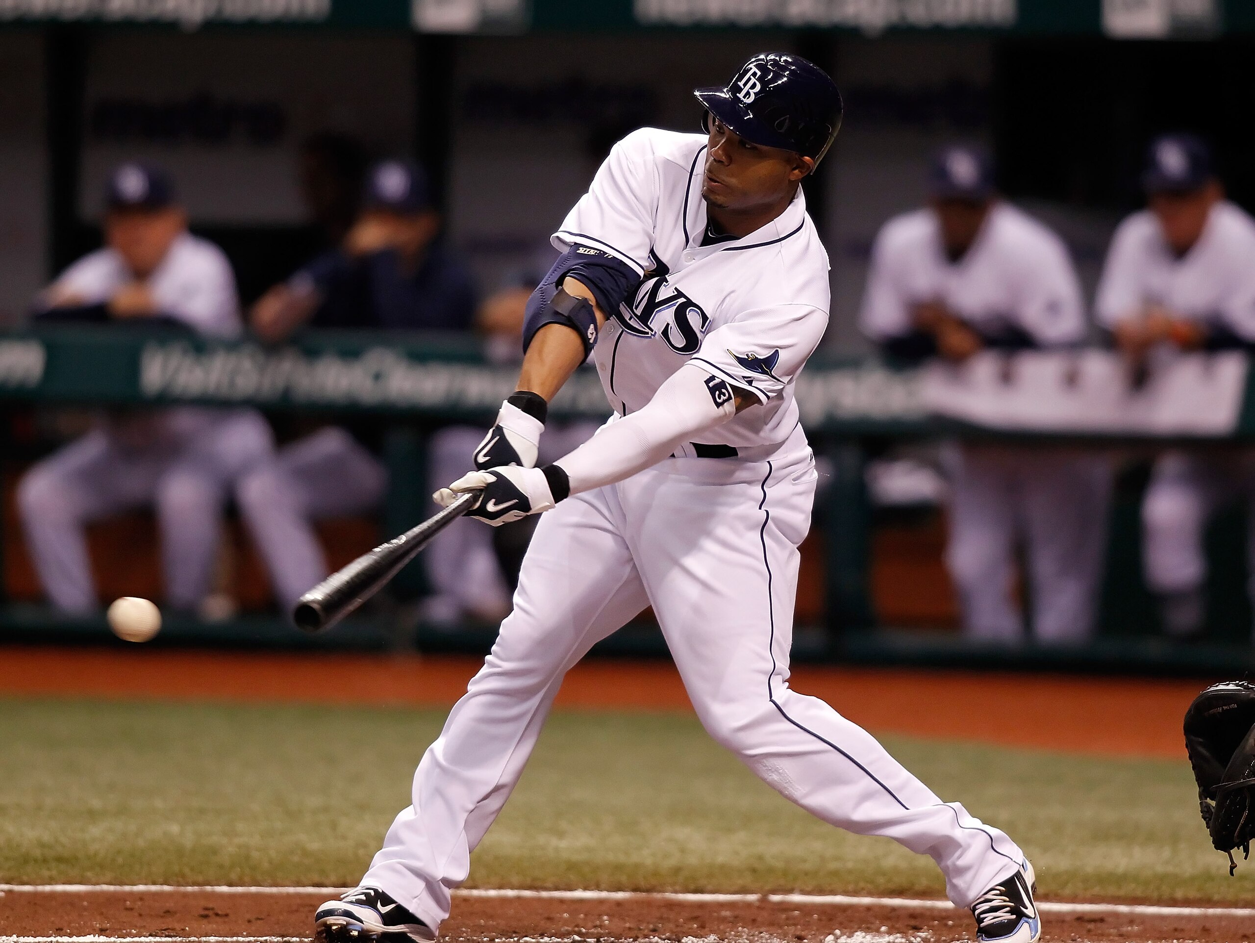 ST. PETERSBURG - SEPTEMBER 27:  Carl Crawford #13 of the Tampa Bay Rays fouls off a pitch against the Baltimore Orioles during the game at Tropicana Field on September 27, 2010 in St. Petersburg, Florida.  (Photo by J. Meric/Getty Images)