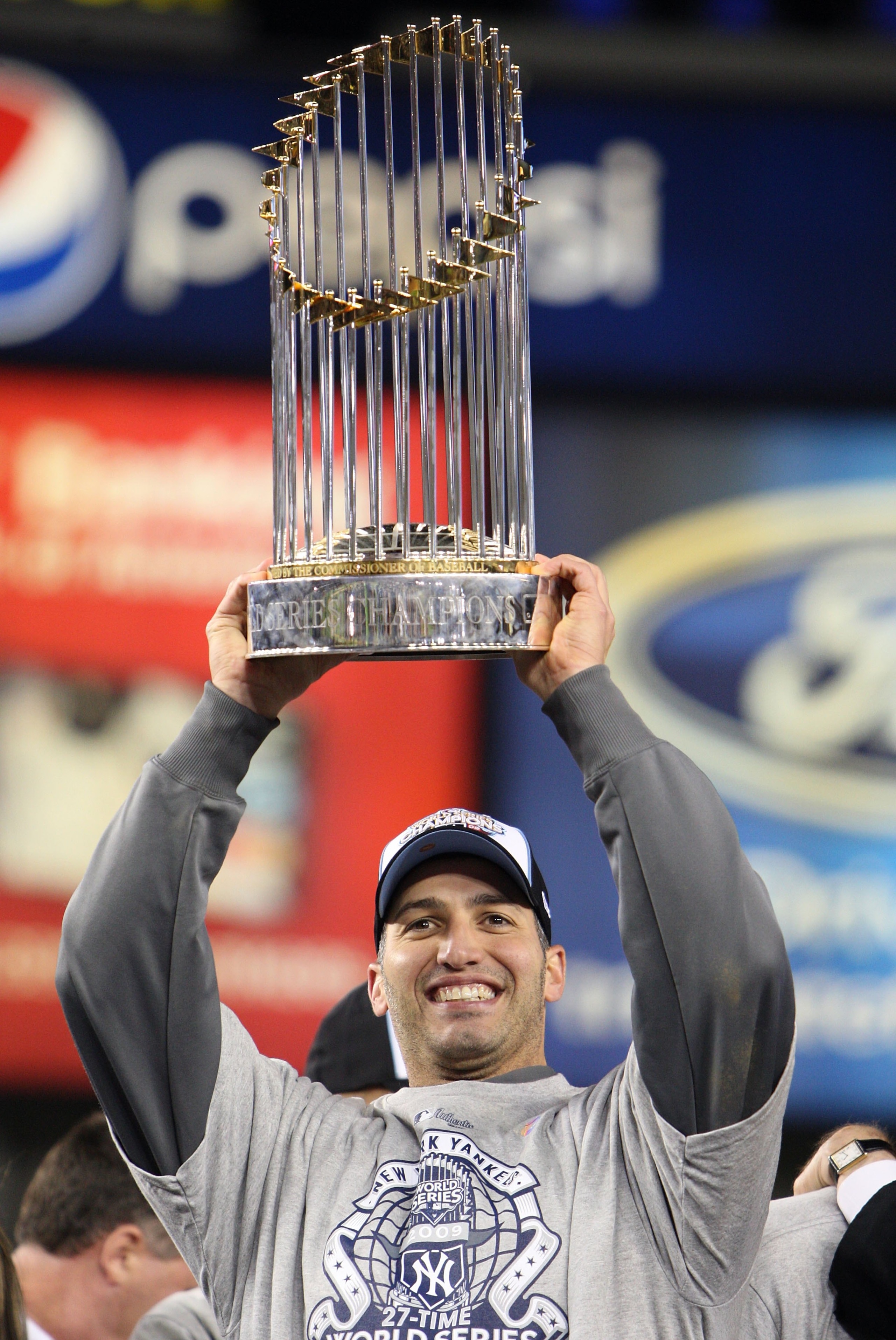 NEW YORK - NOVEMBER 04: Andy Pettitte #46 of the New York Yankees celebrates with the trophy after their 7-3 win against the Philadelphia Phillies in Game Six of the 2009 MLB World Series at Yankee Stadium on November 4, 2009 in the Bronx borough of New NEW YORK - NOVEMBER 04: Andy Pettitte #46 of the New York Yankees celebrates with the trophy after their 7-3 win against the Philadelphia Phillies in Game Six of the 2009 MLB World Series at Yankee Stadium on November 4, 2009 in the Bronx borough of New