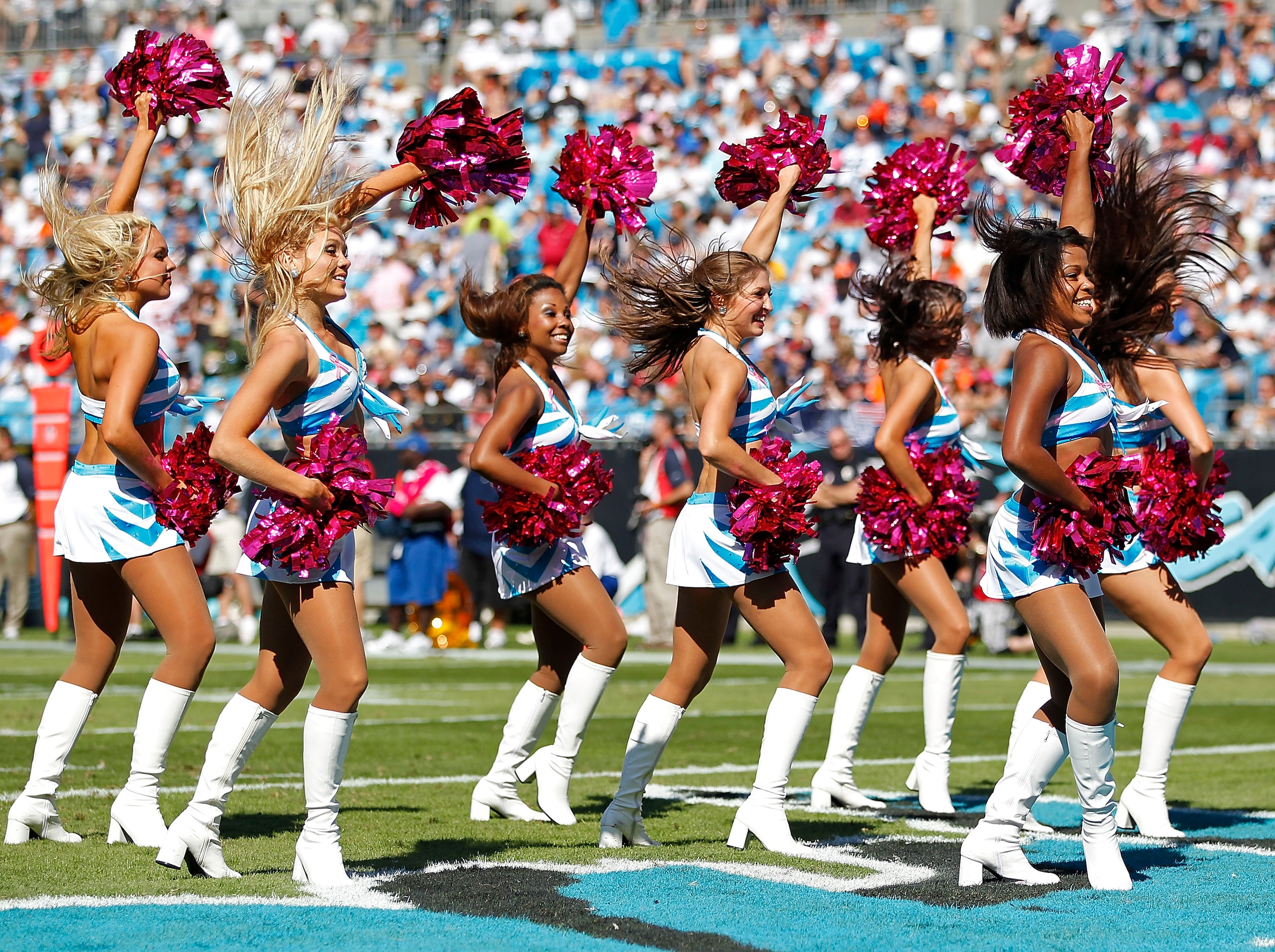 CHARLOTTE, NC - OCTOBER 10: Carolina Panthers cheerleaders perform during the Panthers game against the Chicago Bears at Bank of America Stadium on October 10, 2010 in Charlotte, North Carolina. (Photo by Geoff Burke/Getty Images)