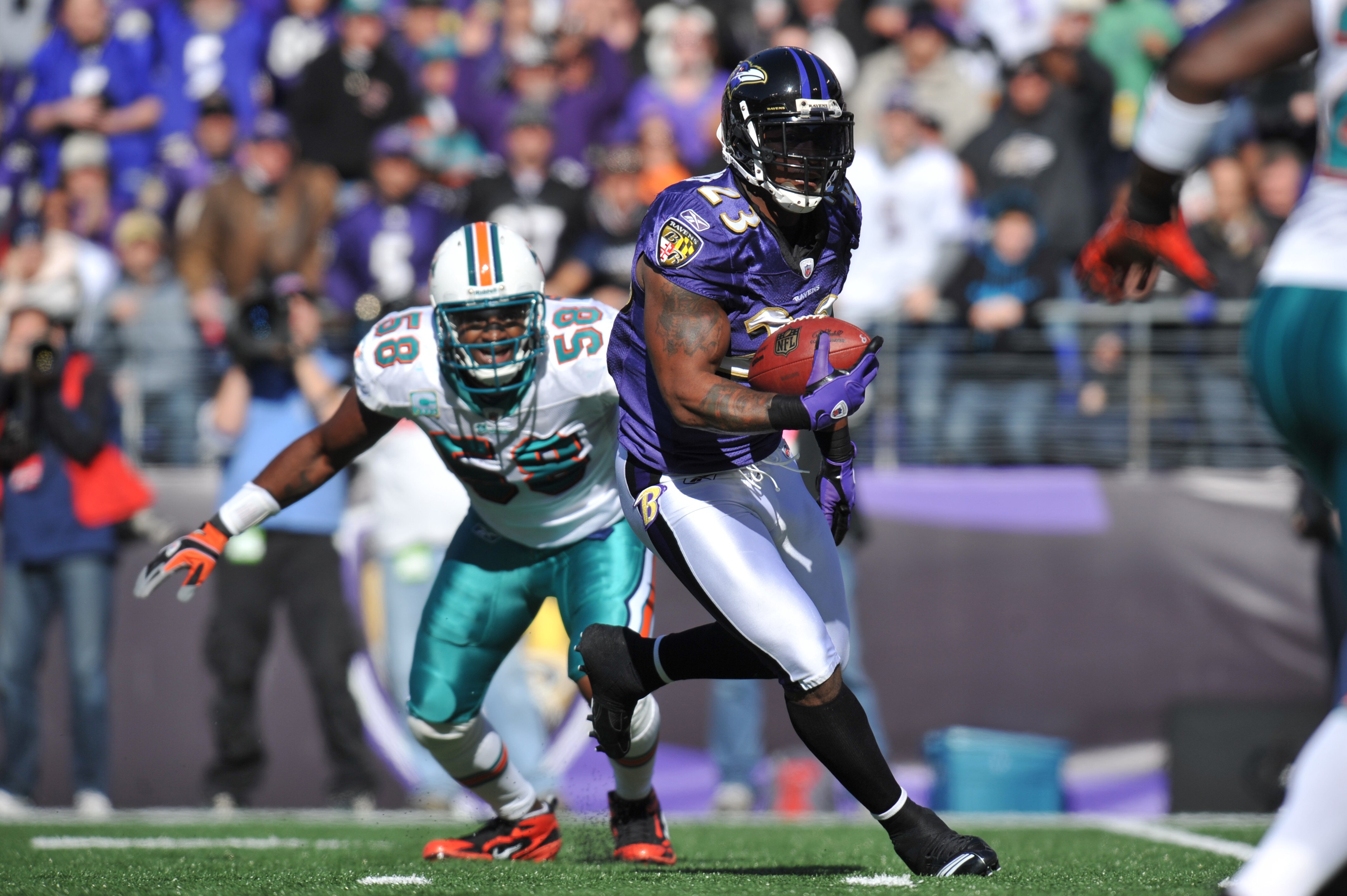 BALTIMORE, MD - NOVEMBER 7:  Willis McGahee #23 of the Baltimore Ravens runs the ball against the Miami Dolphins at M&T Bank Stadium on November 7, 2010 in Baltimore, Maryland. The Ravens defeated the Dolphins 26-10. (Photo by Larry French/Getty Images)