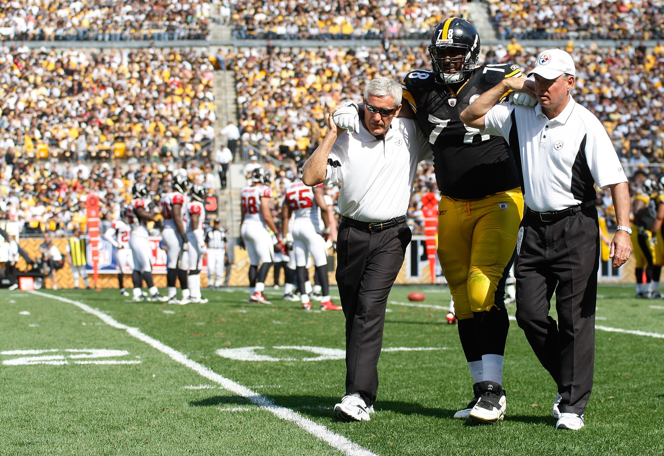 PITTSBURGH - SEPTEMBER 12:  Max Starks #78 of the Pittsburgh Steelers is helped off of the field after getting injured against the Atlanta Falcons during the NFL season opener game on September 12, 2010 at Heinz Field in Pittsburgh, Pennsylvania.  (Photo