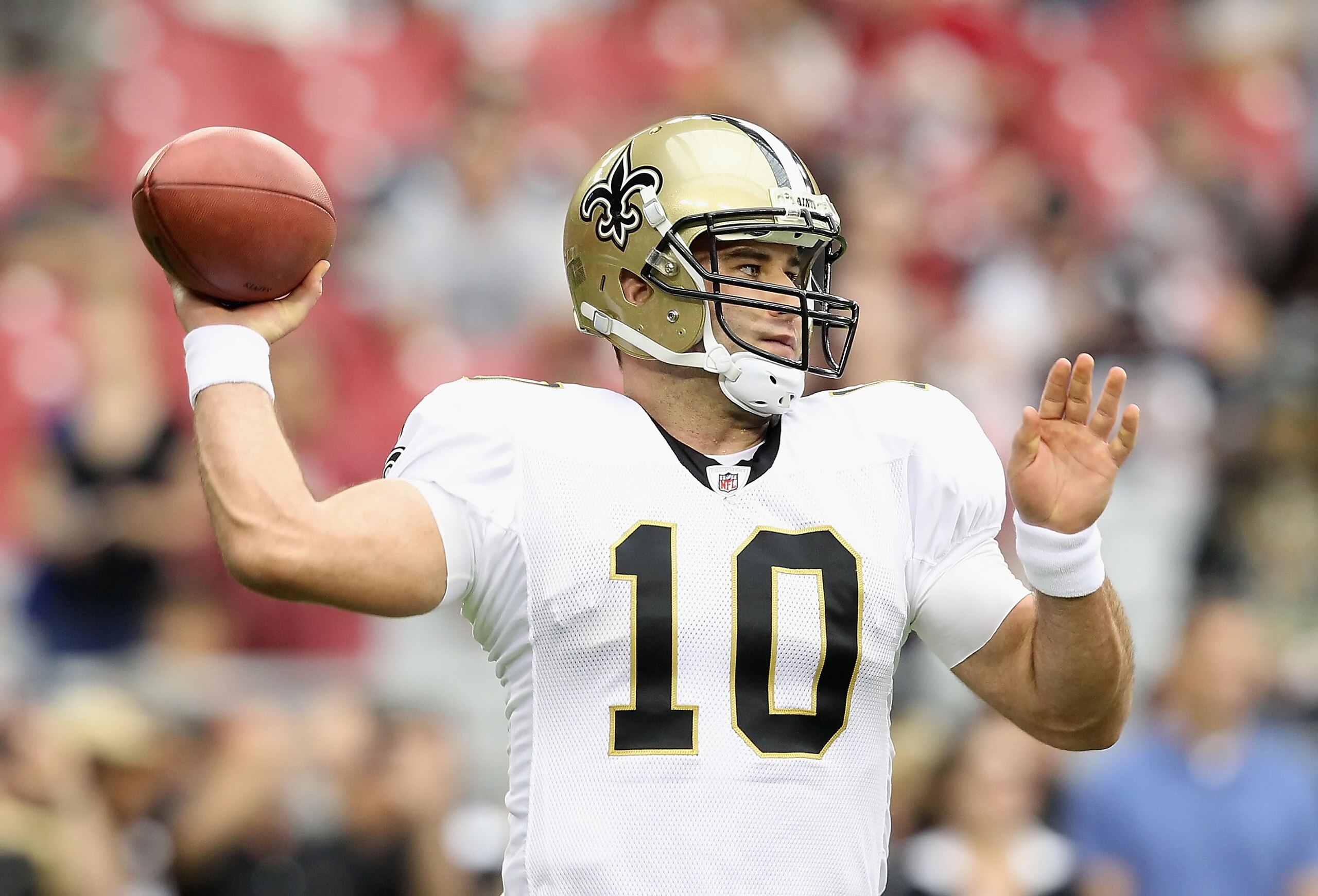 GLENDALE, AZ - OCTOBER 10:  Quarterback Chase Daniel #10 of the New Orleans Saints warms up before the NFL game against the Arizona Cardinals at the University of Phoenix Stadium on October 10, 2010 in Glendale, Arizona. The Cardinals defeated the Saints
